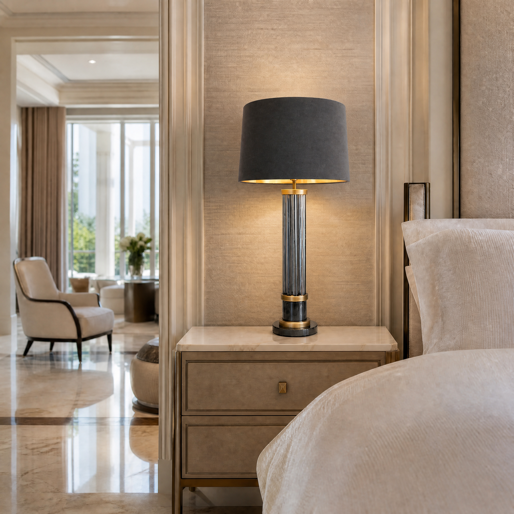 Luxury Valenro table lamp with smoke glass rods illuminating an upscale hotel suite interior