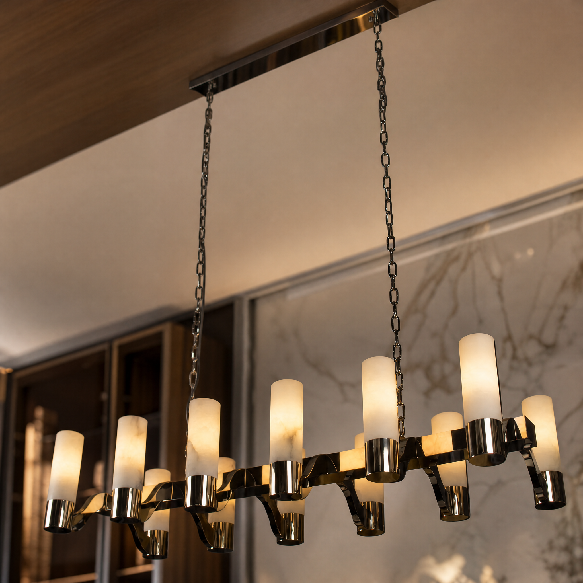 Close-up detailed view of the VORELLI Valenza Chandelier showcasing the sleek lines, fine craftsmanship, and natural texture of the luxury marble shades.
