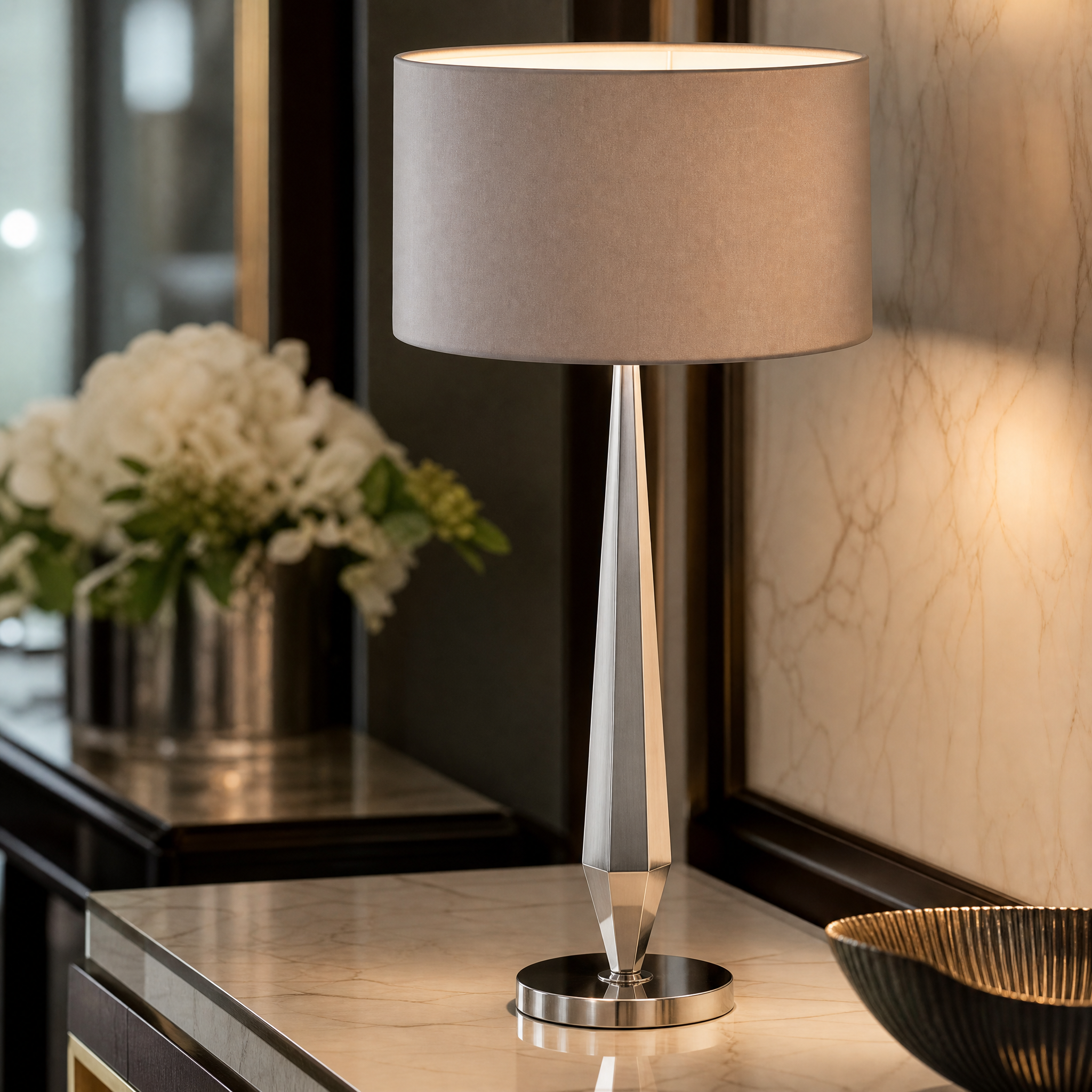 Detailed closeup shot of the Velmora table lamp showcasing its refined tapered silhouette and sleek brushed nickel finish.