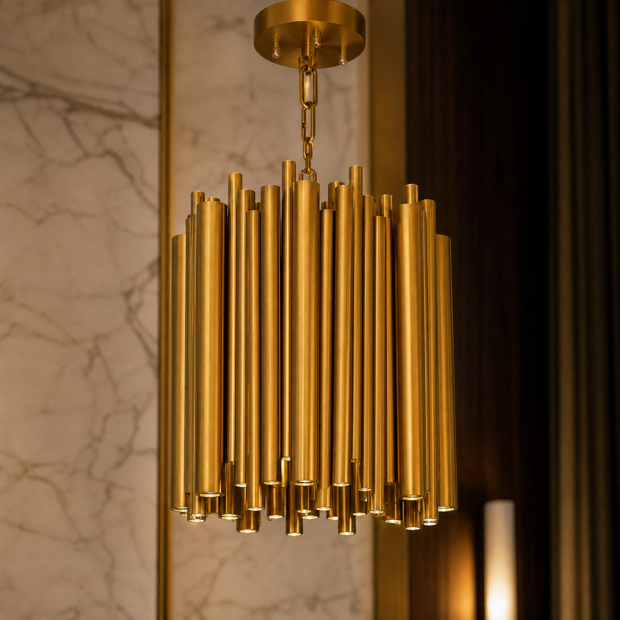 Detailed closeup of the Vitacura pendant light showing the premium brushed copper finish and sleek stainless steel accents.