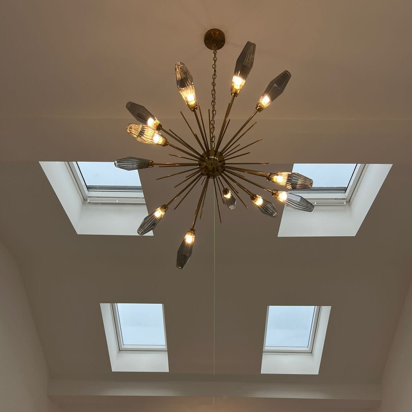 VORELLI® Abdera Pendant chandelier viewed from below, illuminating a high ceiling space