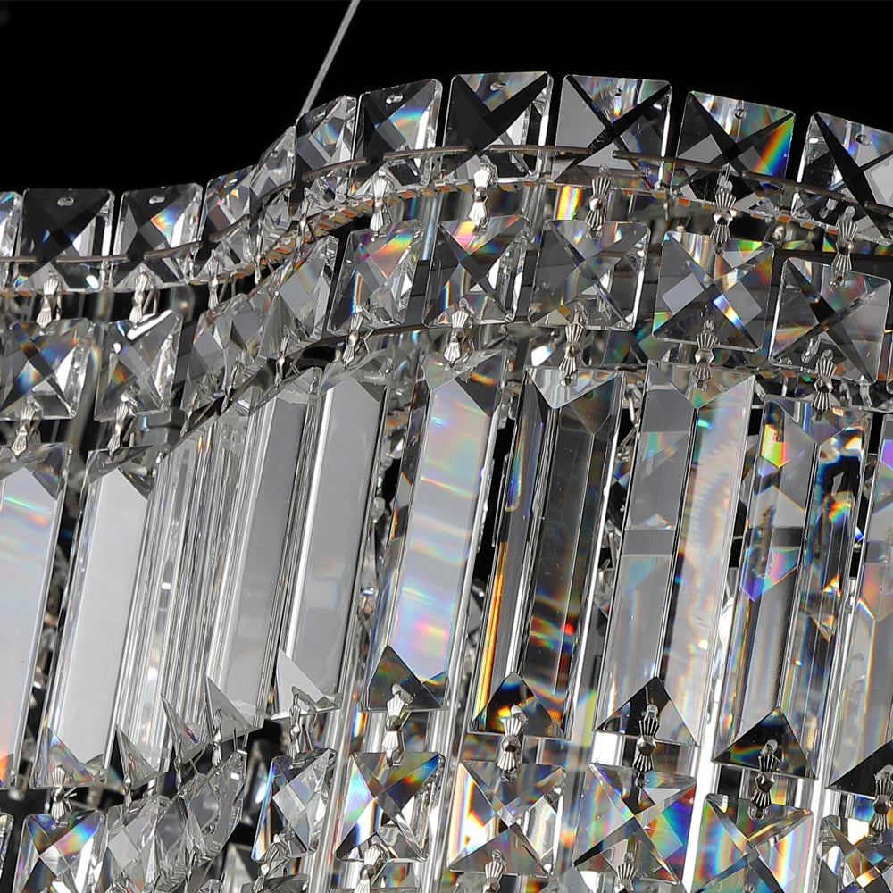 Detail shot of layered crystal prisms on VORELLI® Abruzzi Rectangular Chandelier II showing modern texture