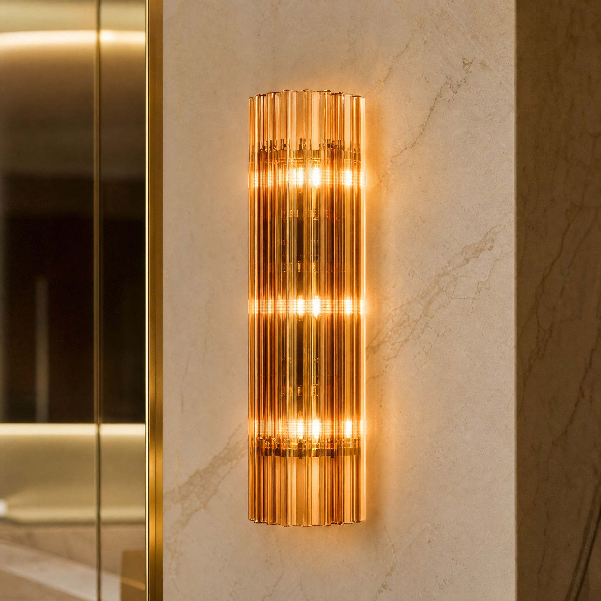 Macro close-up shot revealing the bold, vibrant textures of the individual amber glass pieces on the Amarino light fixture.
