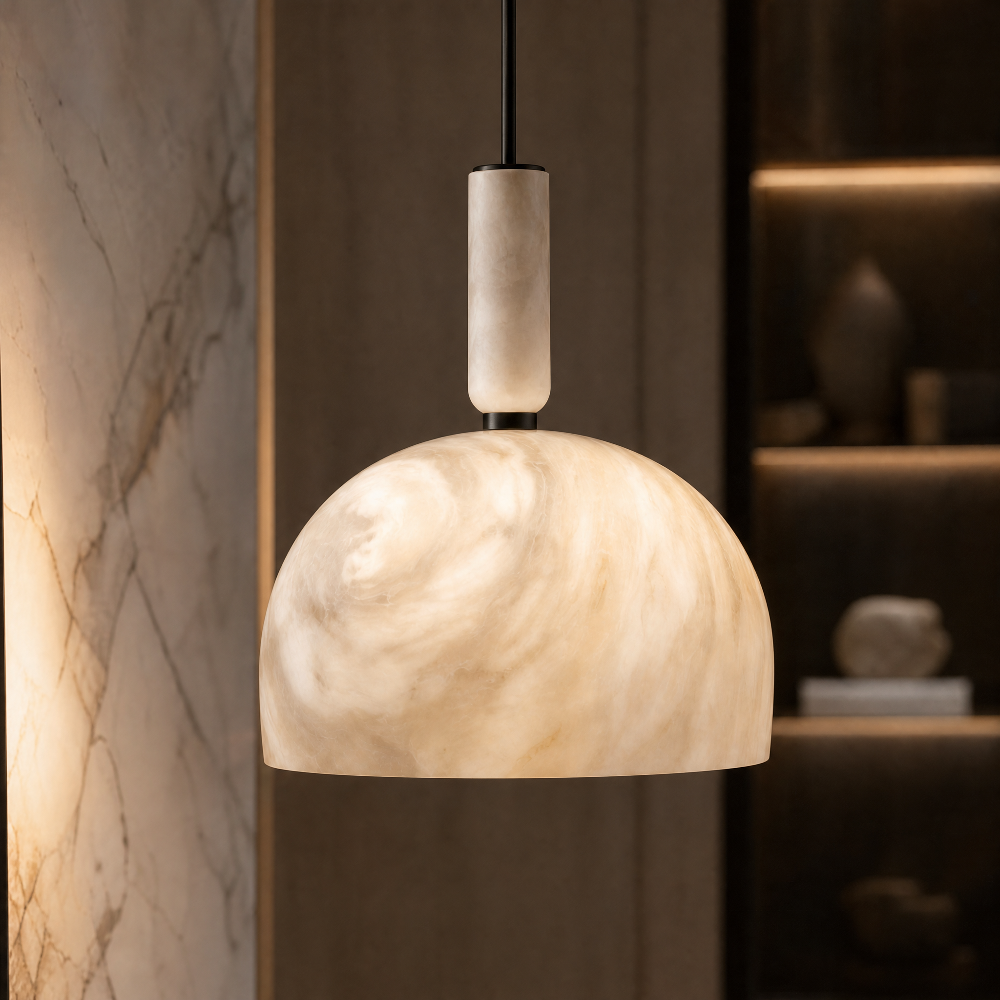 Detailed closeup of the VORELLI Aphrodite pendant light, highlighting the delicately sculpted marble dome texture and minimalist cylindrical stem.