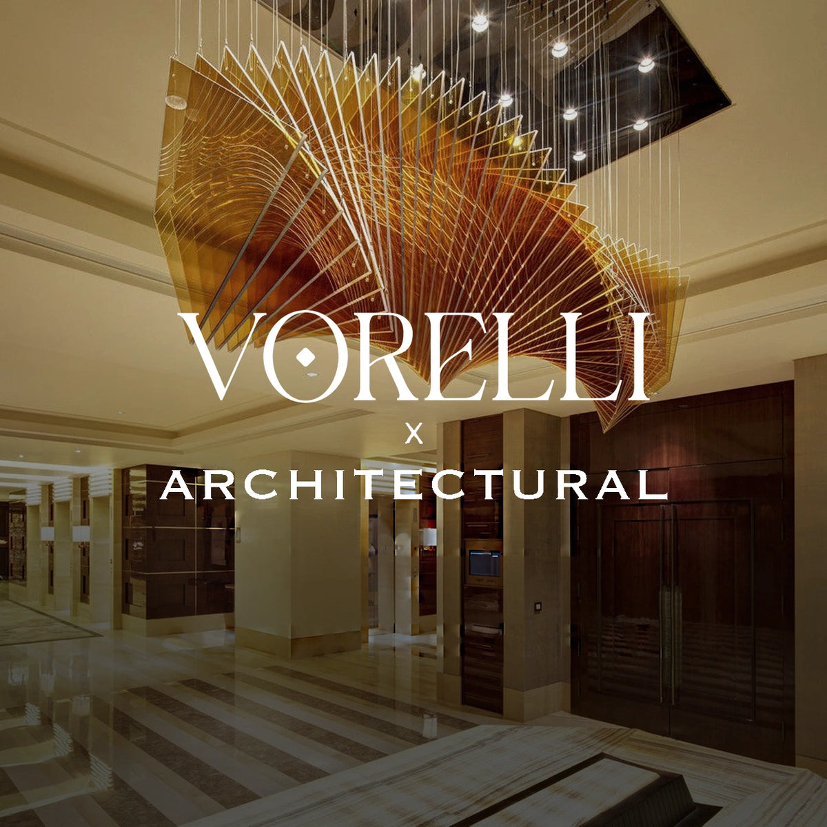 VORELLI® x Architectural lighting collection — sculptural chandelier in a double-height interior.