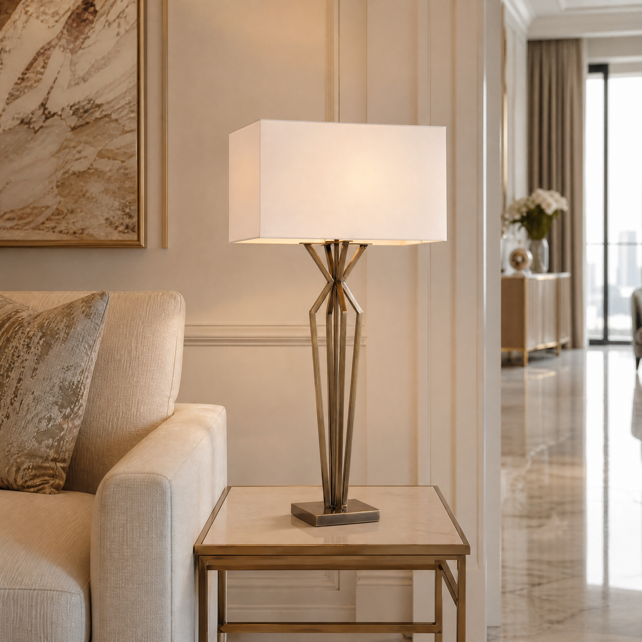 VORELLI Arvante Brass Table Lamp styled on a luxury living room console table, creating a warm, sophisticated ambiance in a residential interior.