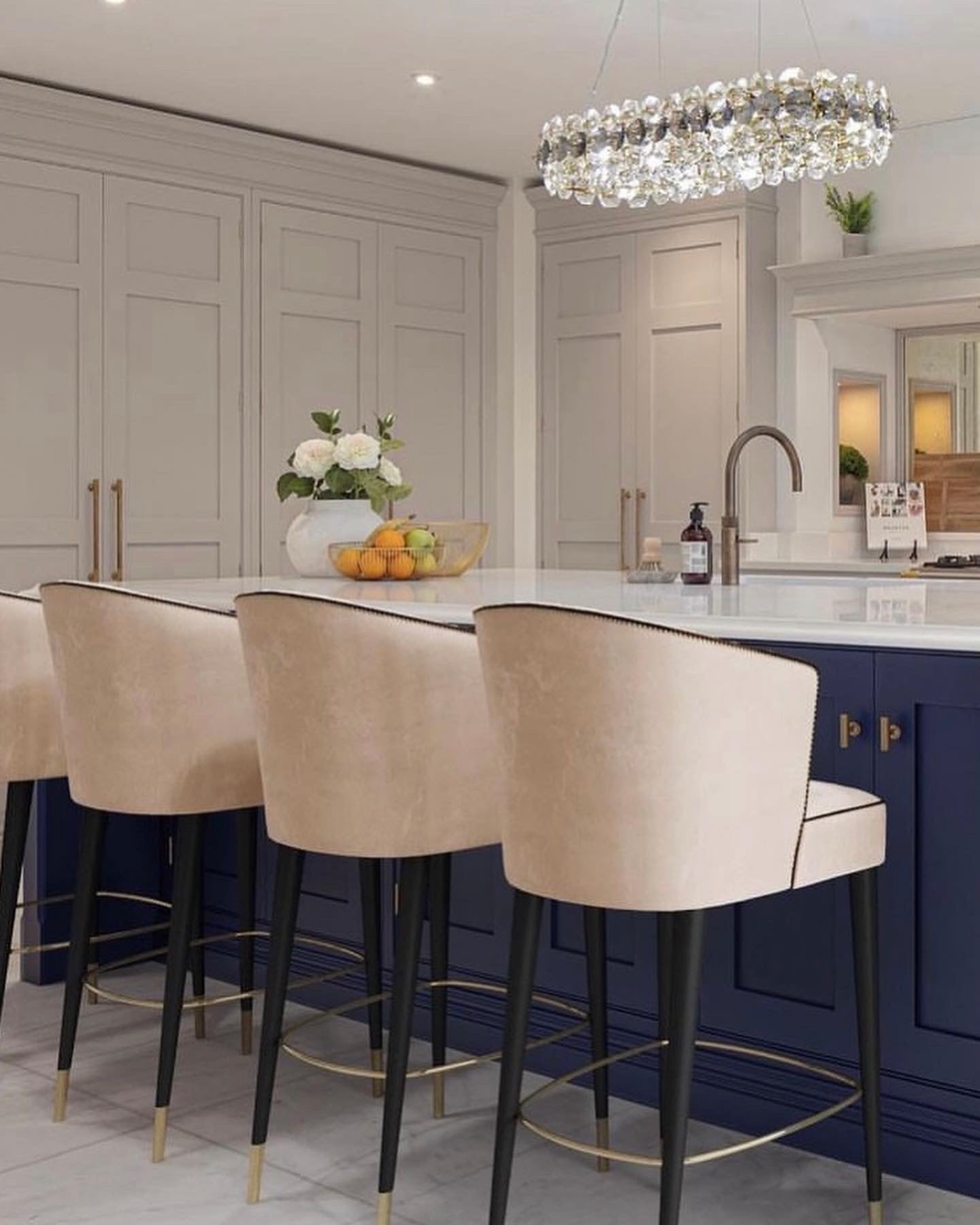 Award-winning luxury kitchen featuring the Astoria rectangular chandelier with diamond cut crystals by VORELLI®