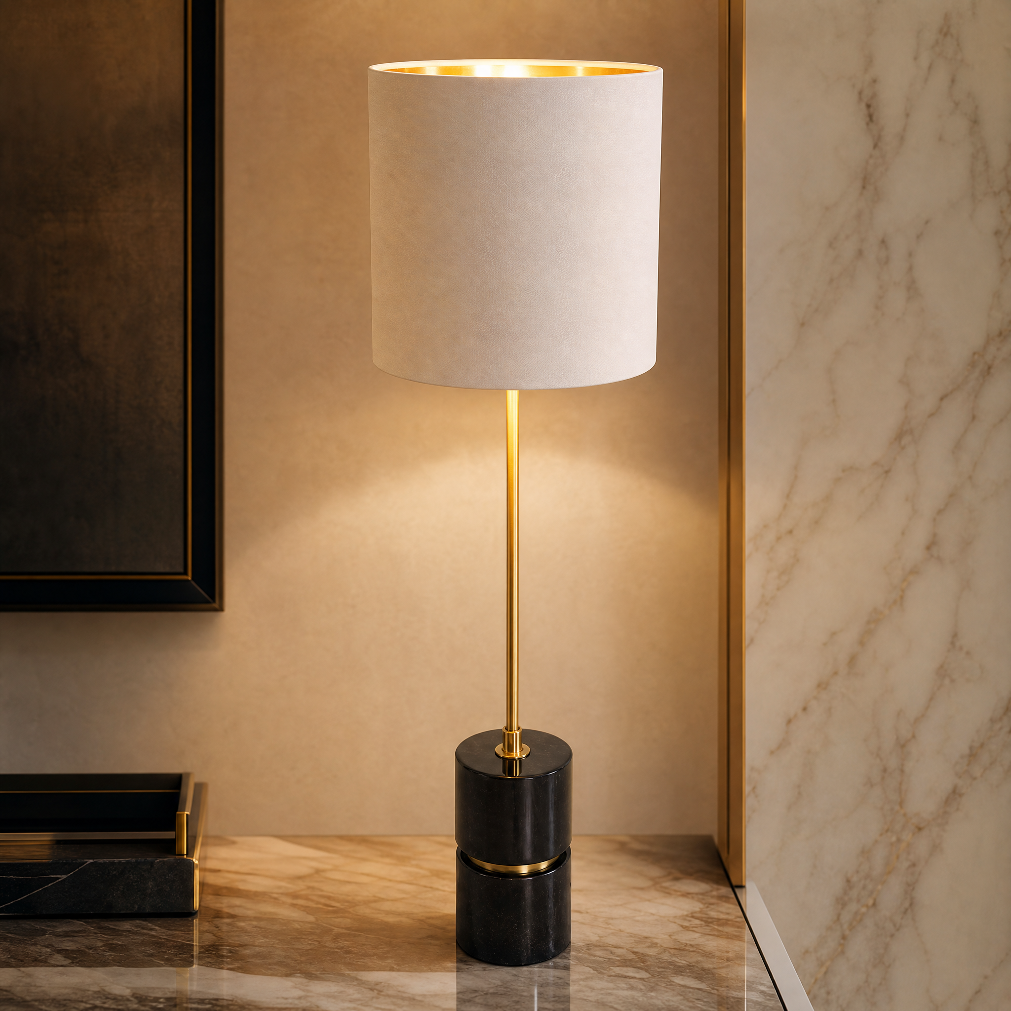 Close-up detail of the Vorelli Aurevia tall table lamp, highlighting the natural veining of the black marble and refined antique brass accents.