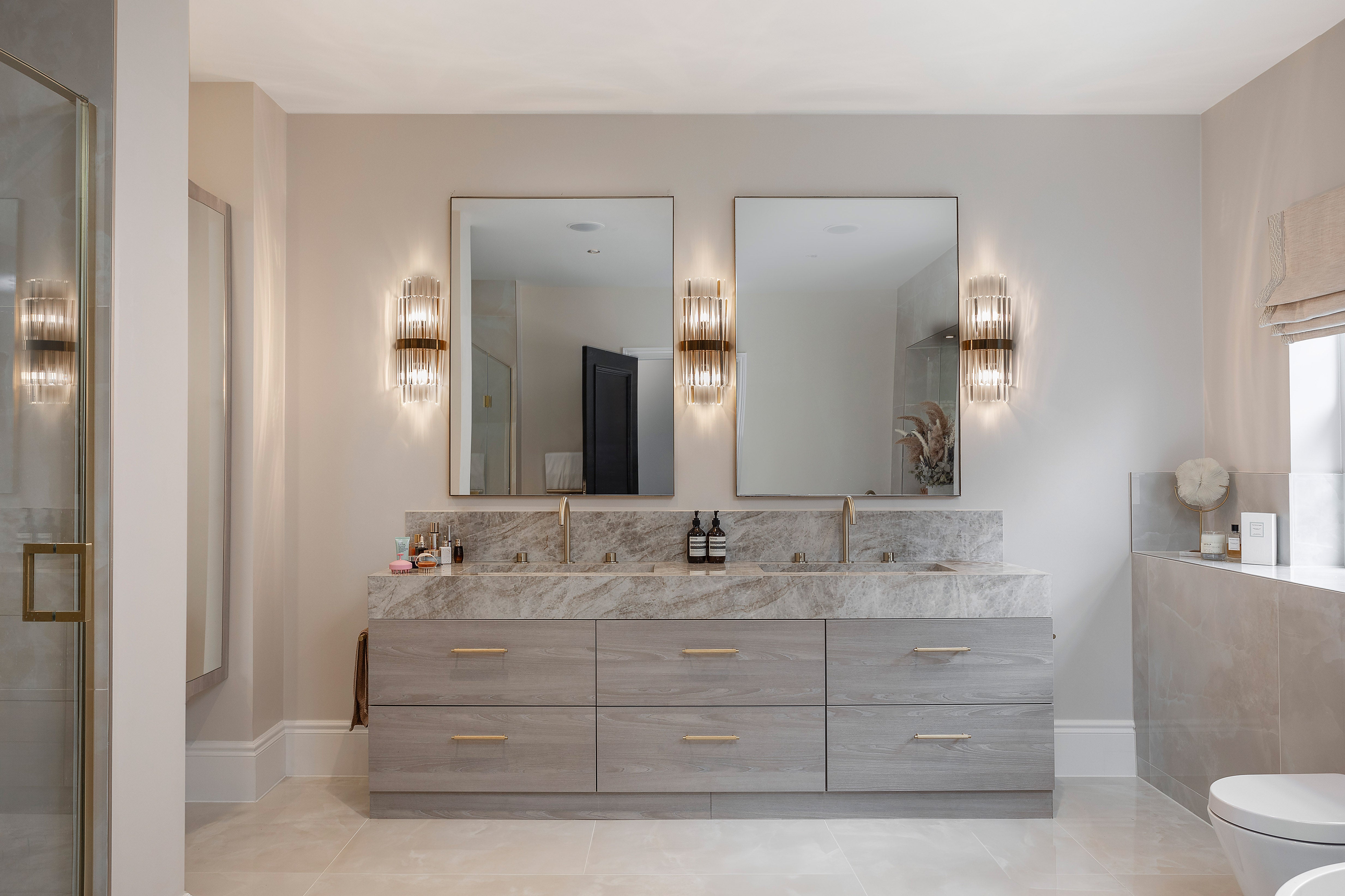 Belair wall light illuminating a contemporary hallway with soft ambient glow.