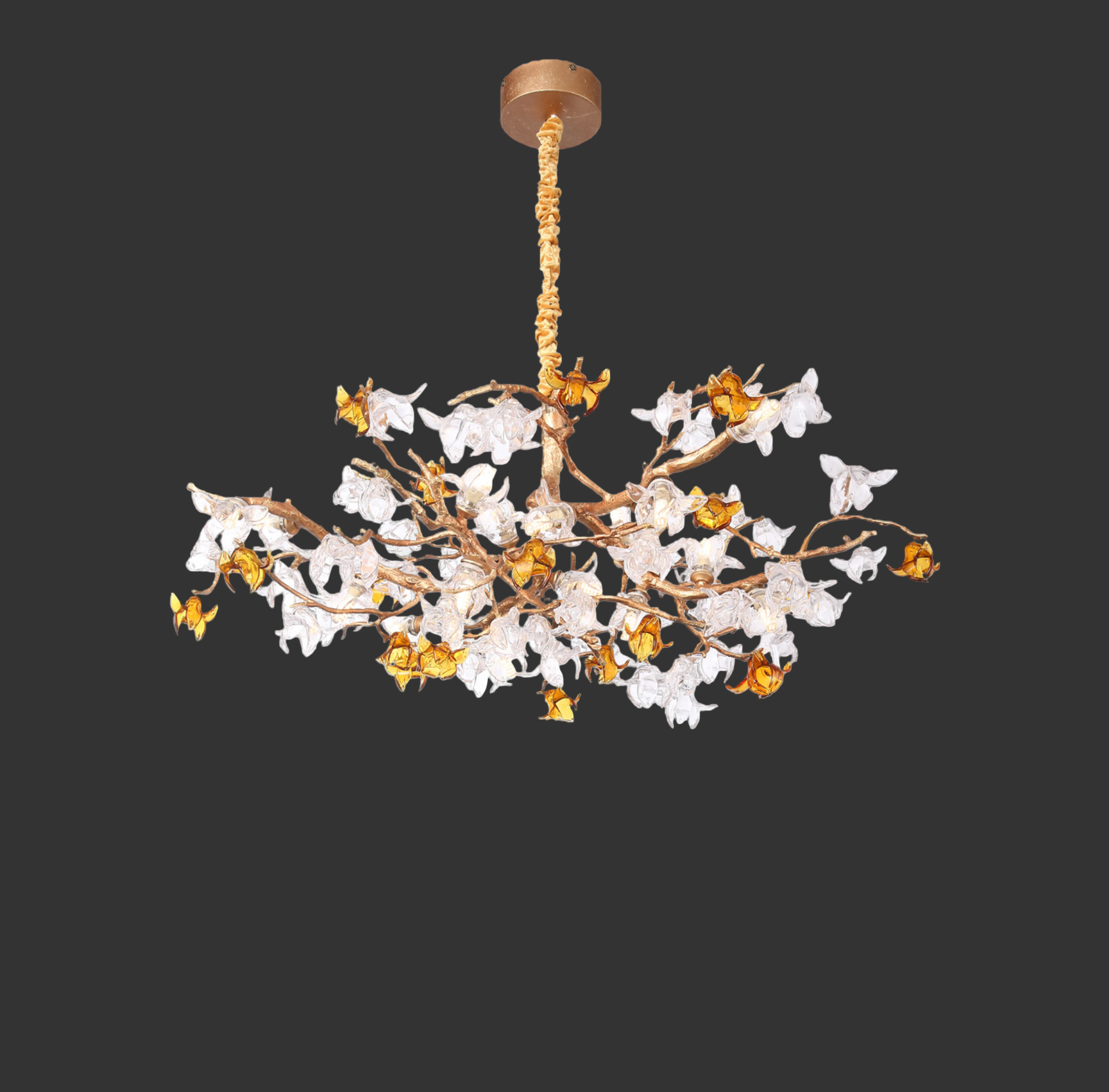 Bloom pendant light featuring sculptural gold branches with hand-blown amber and clear glass flowers.