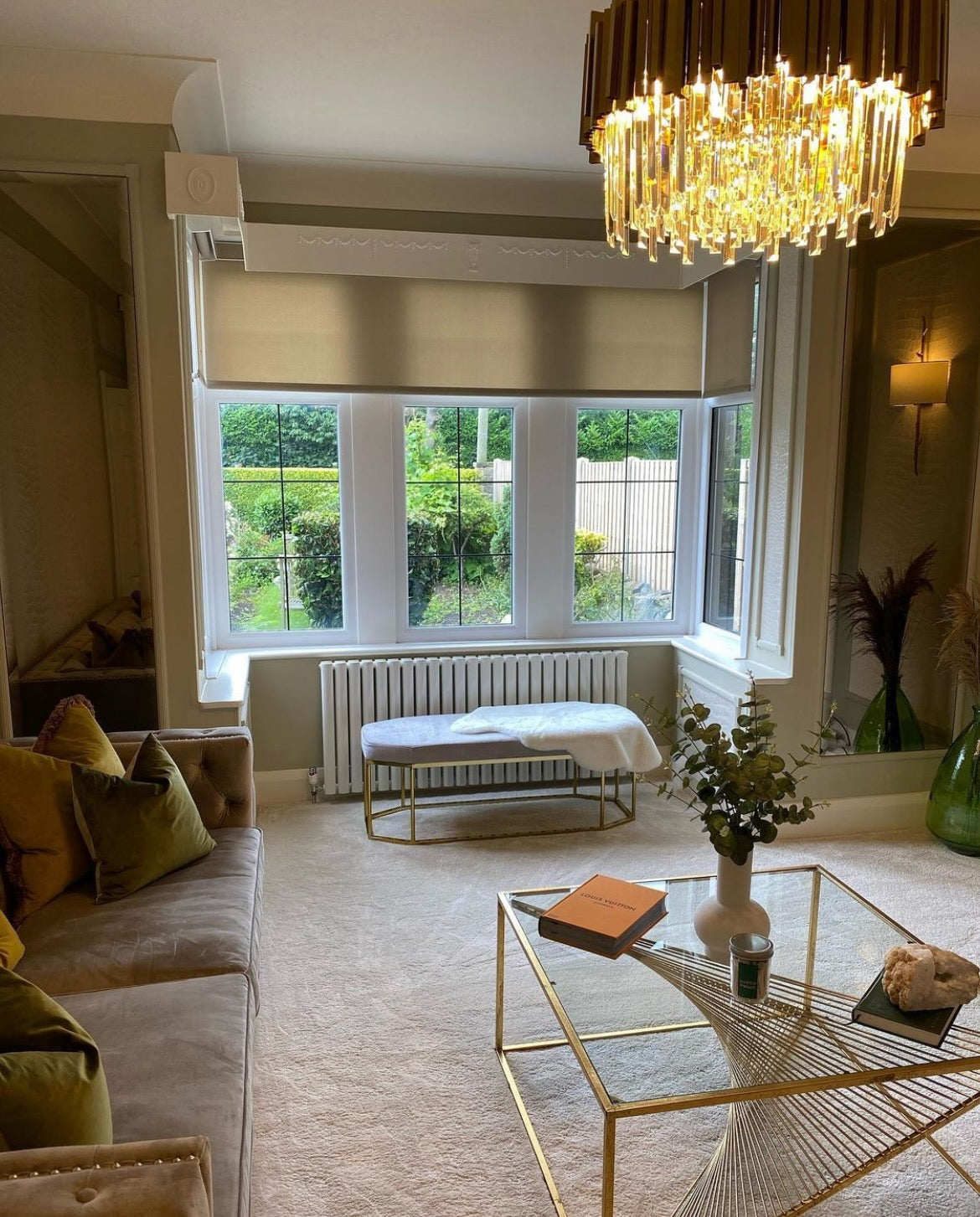 VORELLI® Boeotia Circular Chandelier creating warm ambient lighting in luxury living space