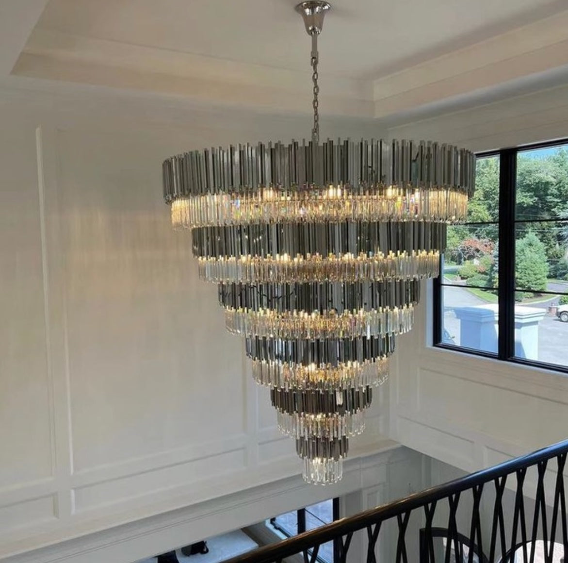 VORELLI® Boeotia Grandeur crystal staircase chandelier suspended through a multi-level luxury interior