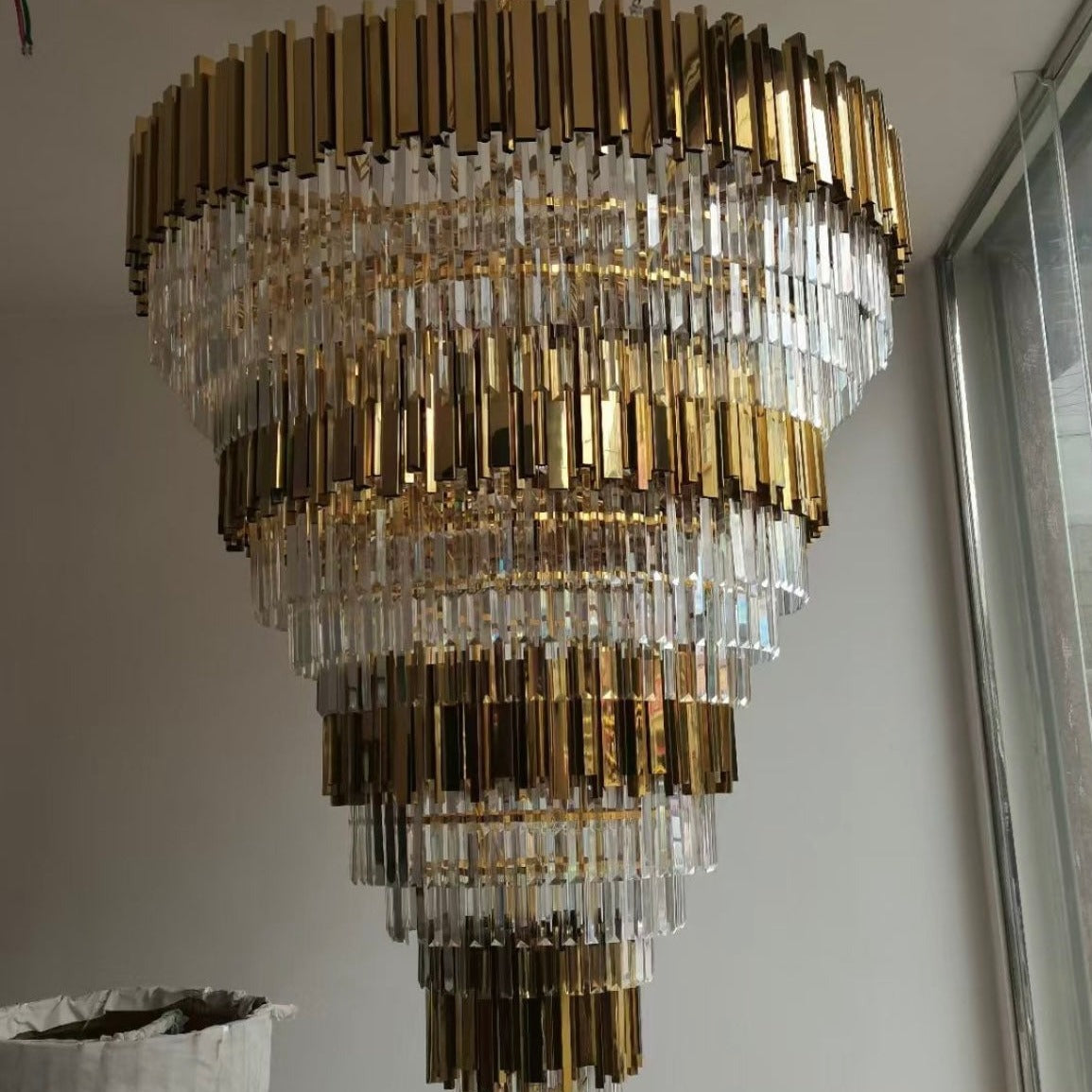 VORELLI® Boeotia Grandeur staircase chandelier showcasing cuboid metal tubing and crystal bar detailing