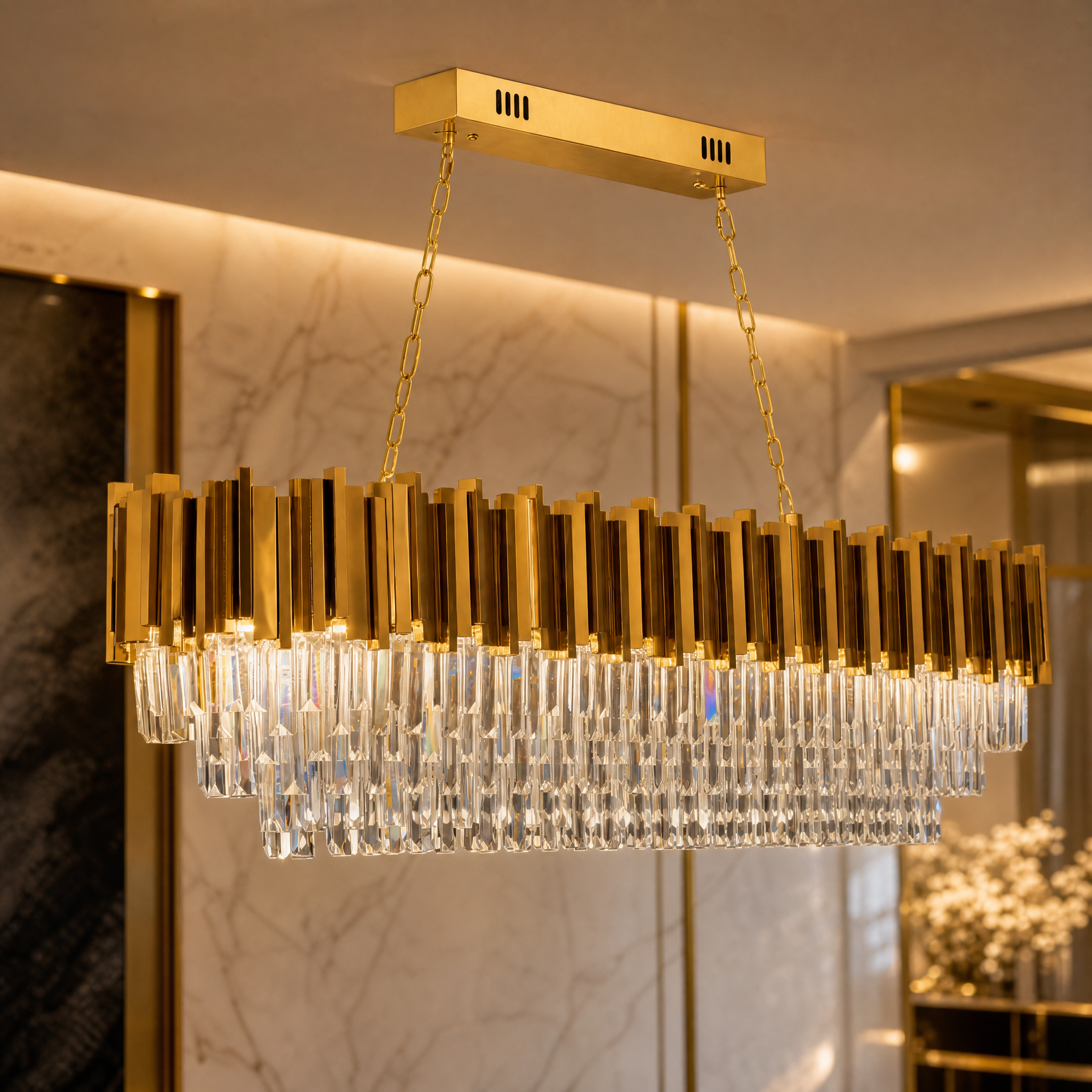 Macro closeup of the sleek crystal bars and cuboid metal tubing of the VORELLI Boeotia rectangular luxury chandelier.