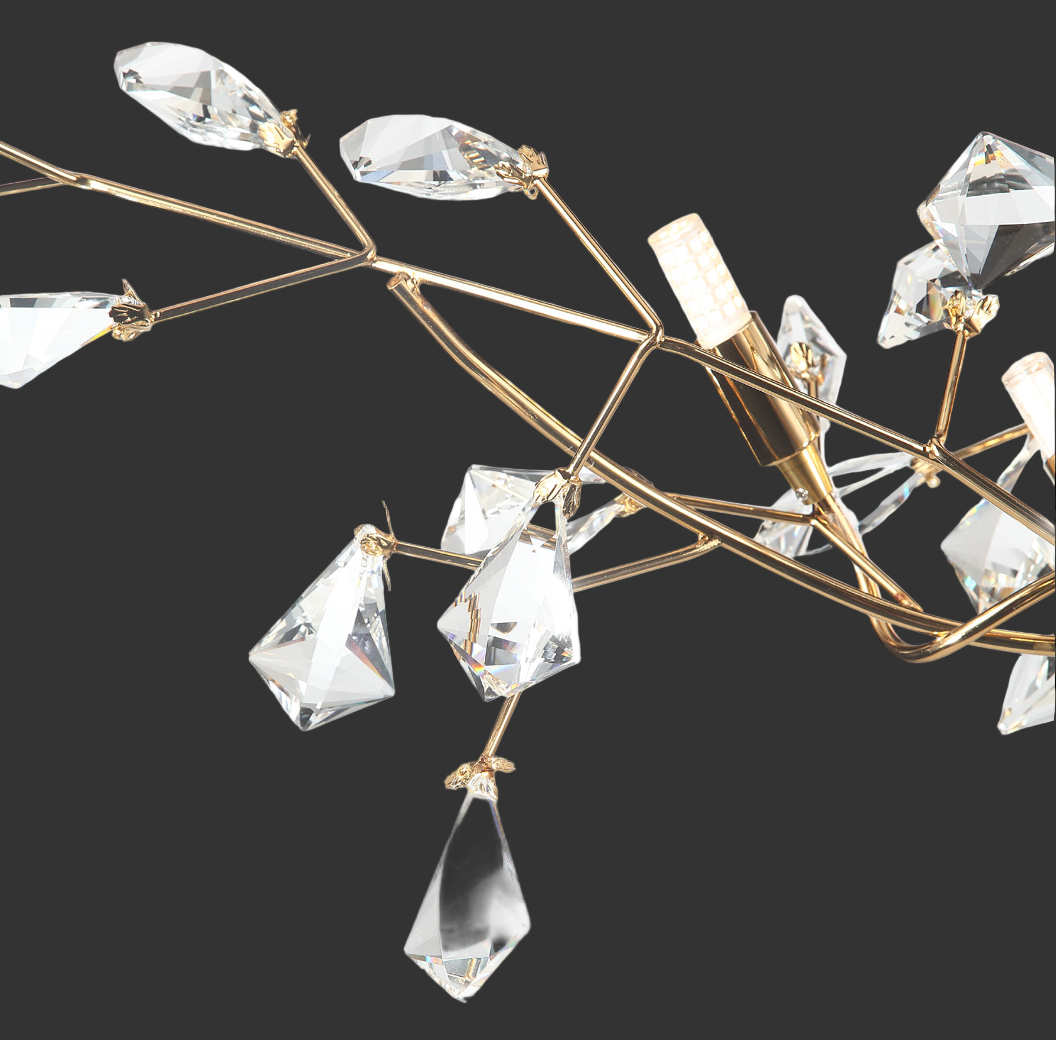 Close-up of Brisella Rectangular Chandelier diamond-cut faceted crystal buds arranged along its sculptural branch-like structure.