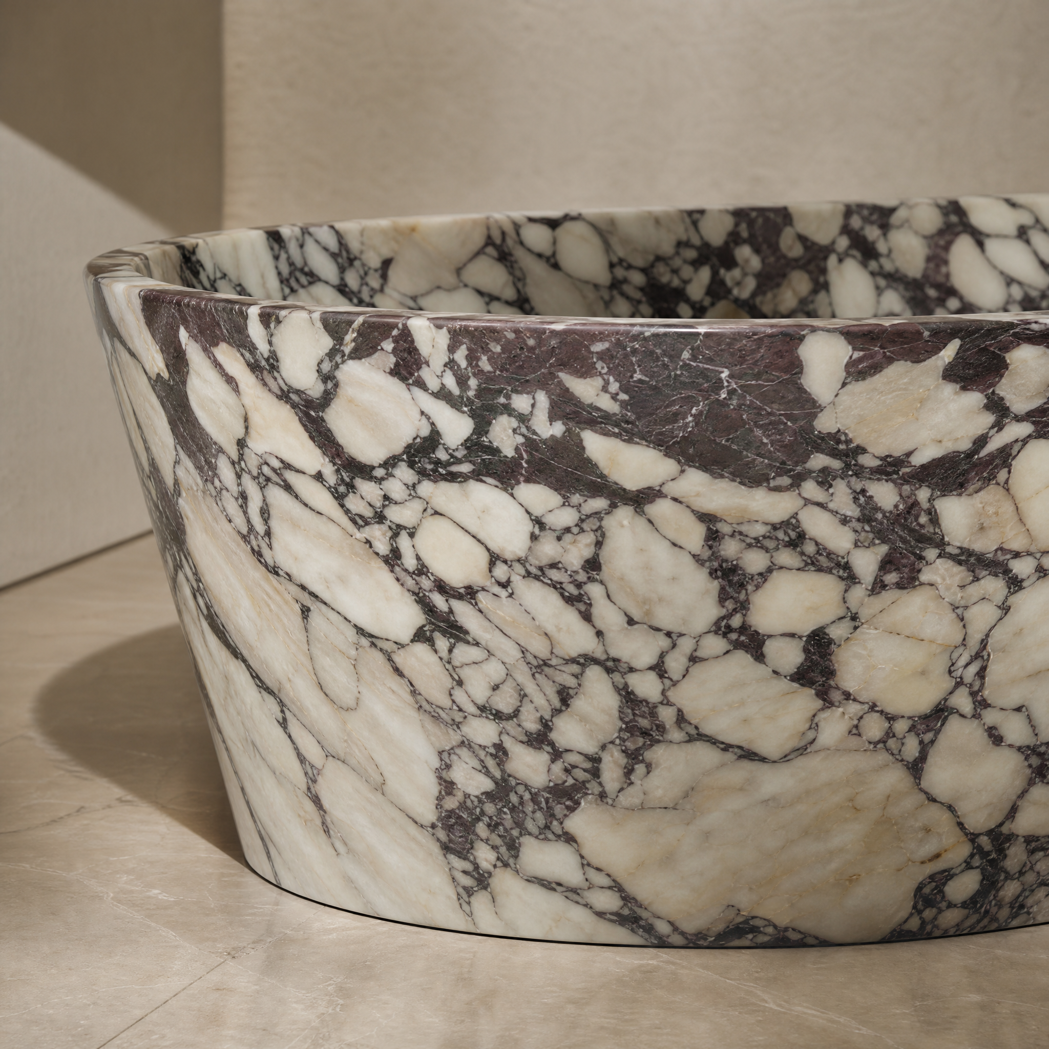 Calacatta Viola Extra Marble Freestanding Bathtub - Tapered stone craftsmanship detail image by VORELLI