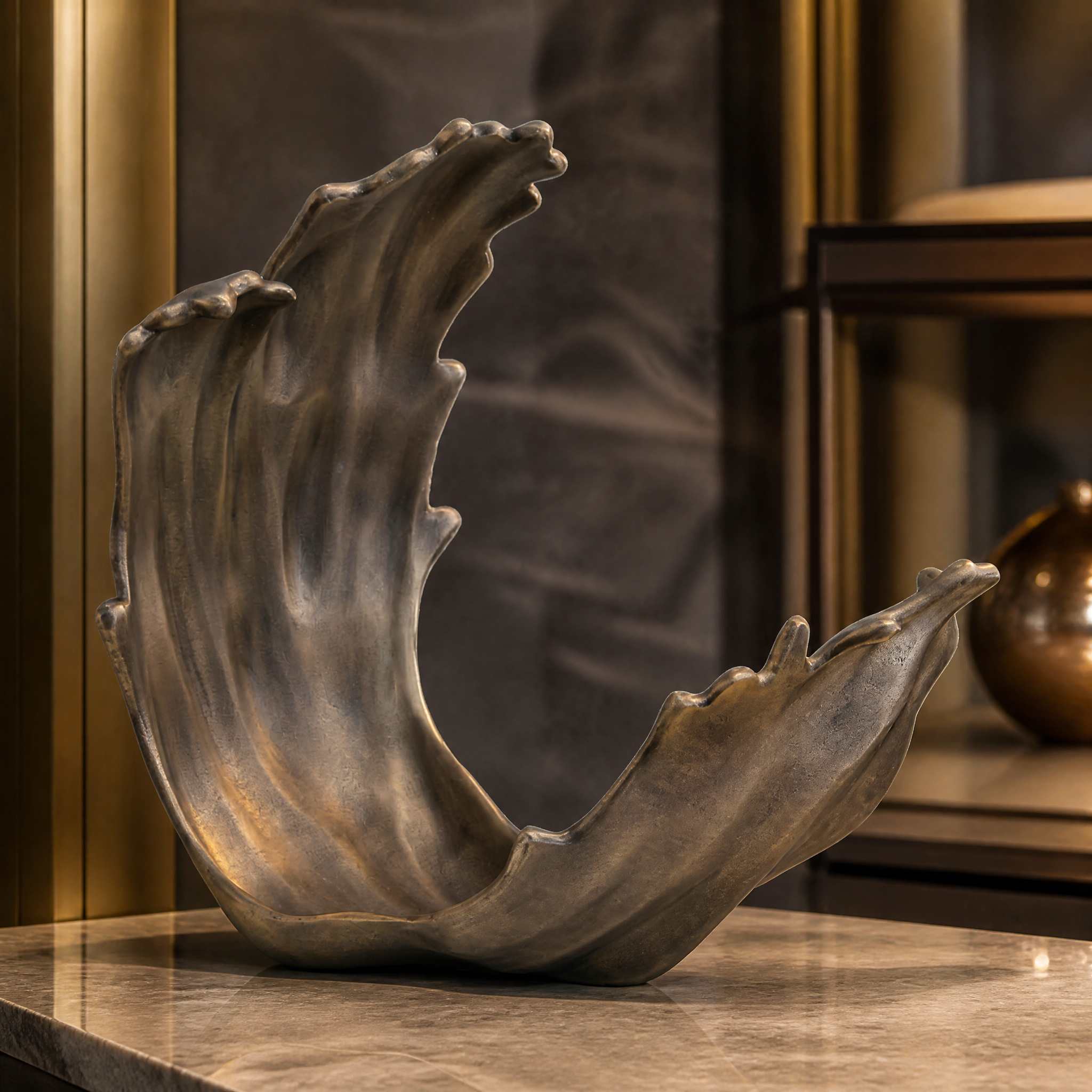 Macro close-up shot of the Vorelli Calvo ornament, detailing the rich textured surface and fine craftsmanship of the antique gold metal finish.