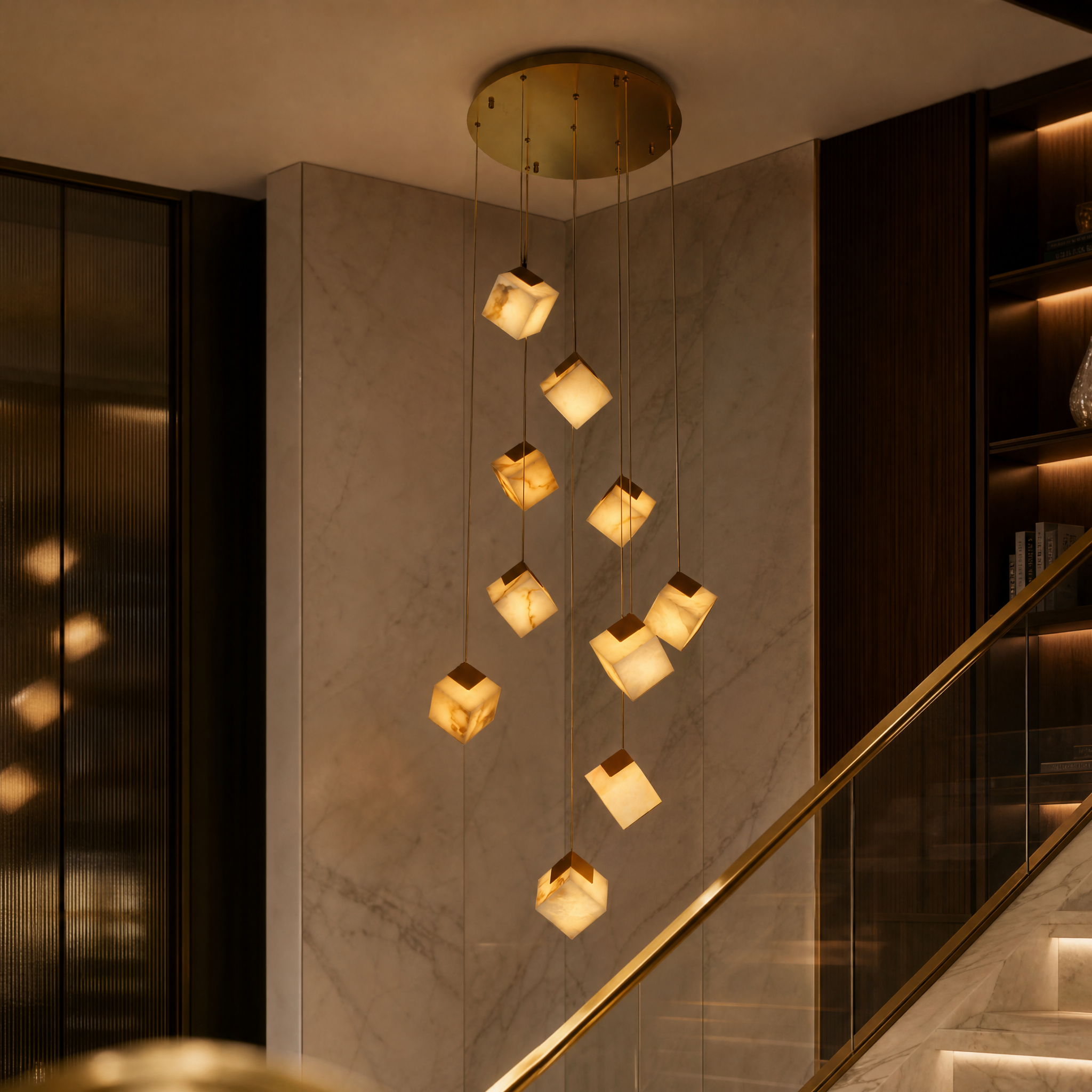 Detailed macro shot of the VORELLI Cube Marble Pendant showing the natural veining and golden translucency of the glowing stone cubes.
