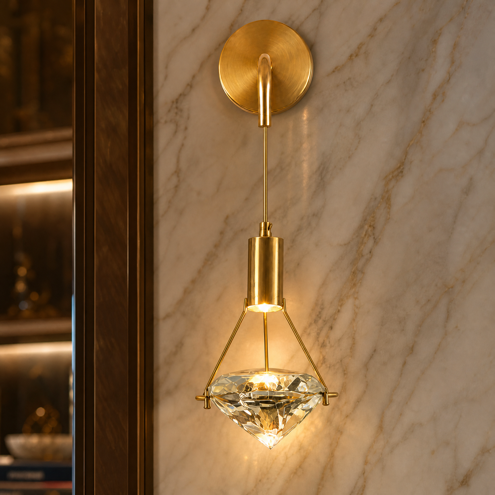 Macro closeup of the VORELLI Diamante Wall Light showing the refined craftsmanship and light-reflecting qualities of its faceted crystal elements.