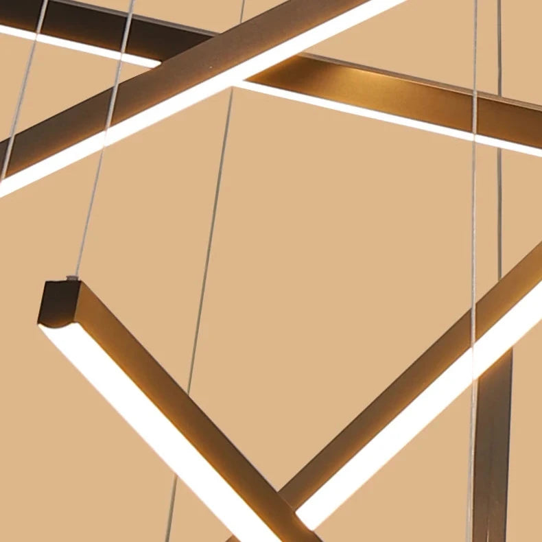 Minimalist intersecting linear LED light bars forming a sculptural chandelier design