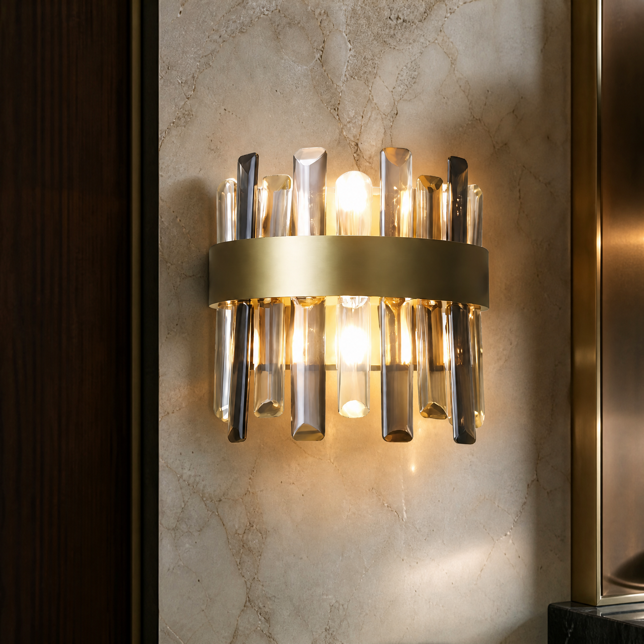 Macro closeup of the Figueroa wall light highlighting the intricate texture of the clear and smoky grey diamond cut crystals against the stainless steel frame.
