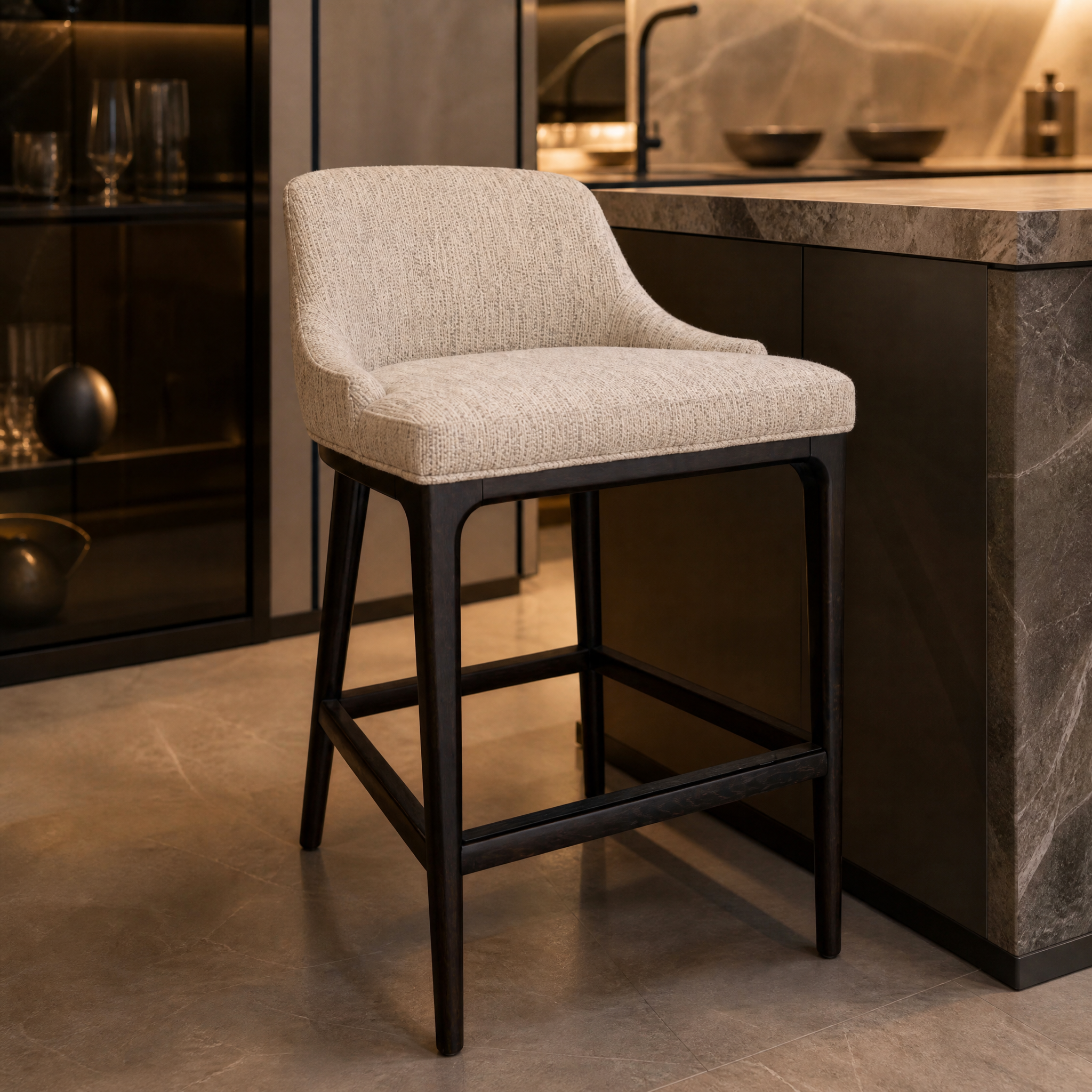 A detailed closeup focusing on the premium soft cream upholstery fabric and refined contemporary lines of the VORELLI Garevo bar stool.
