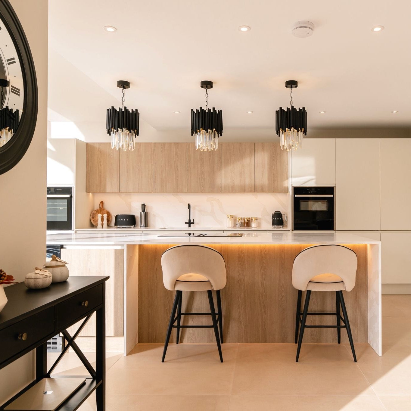 VORELLI Gotham pendant lighting over a modern kitchen island