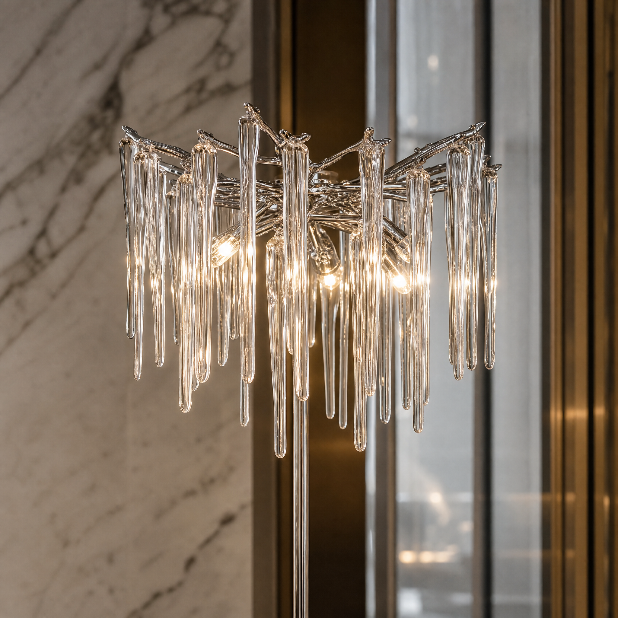 Close up detail of cascading glass drops on the Vorelli Icicle floor lamp structure.