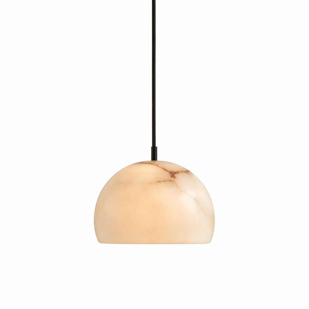 VORELLI Iris marble pendant light showing a warm, atmospheric glow against a dark minimalist background.
