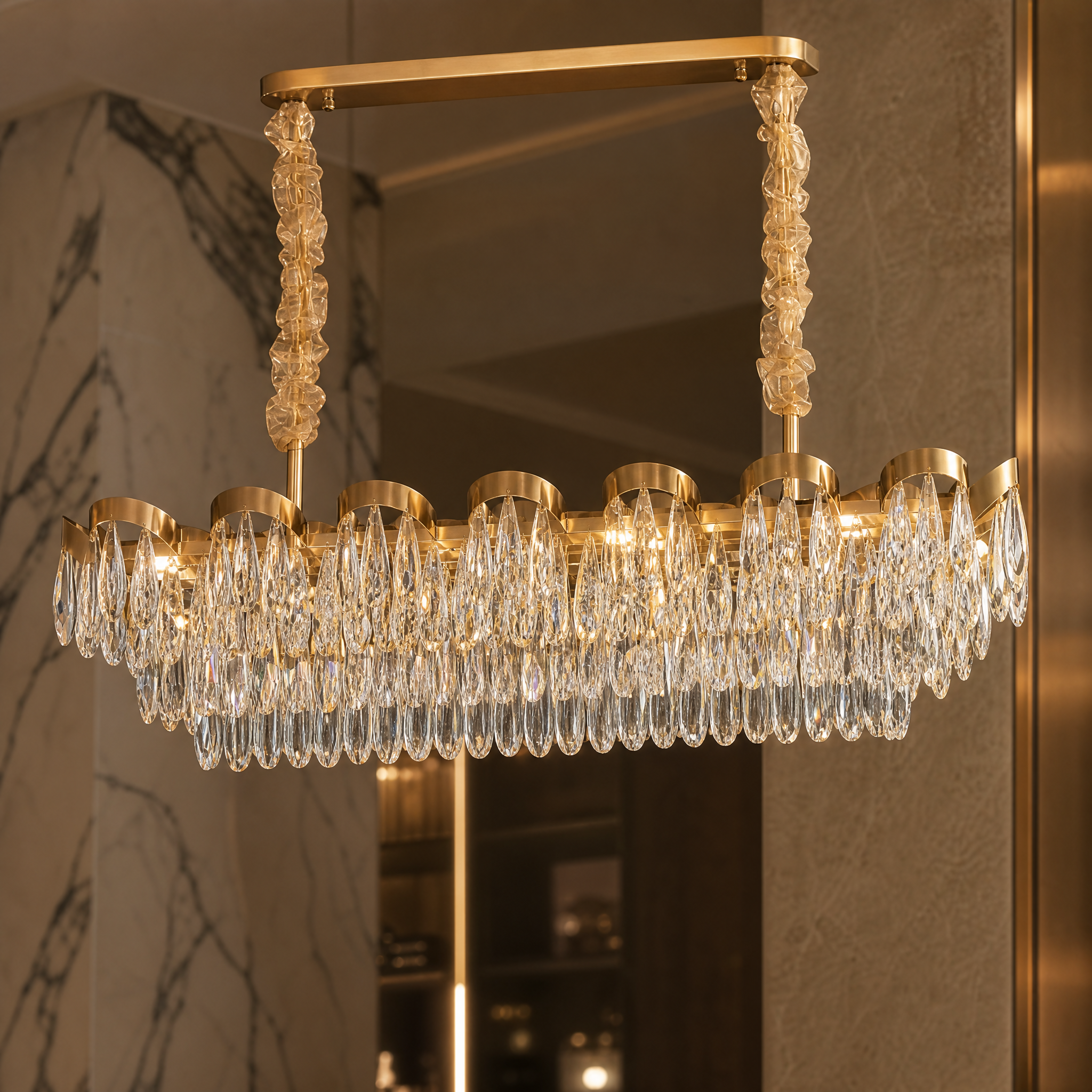Macro closeup shot of the brilliant diamond-cut teardrop crystals on the VORELLI Isso Rectangular Chandelier frame.