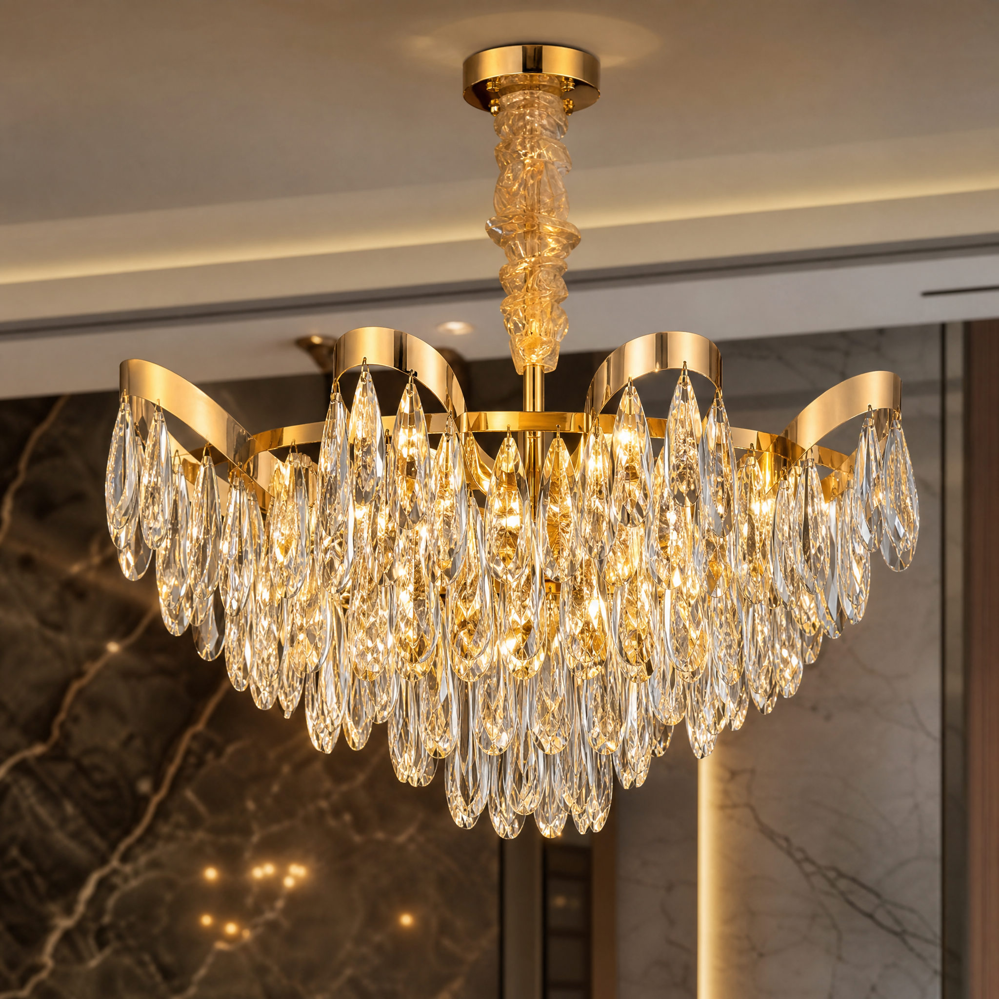 Macro close-up view of the decorative frame and diamond-cut teardrop crystals on the VORELLI Isso Chandelier.