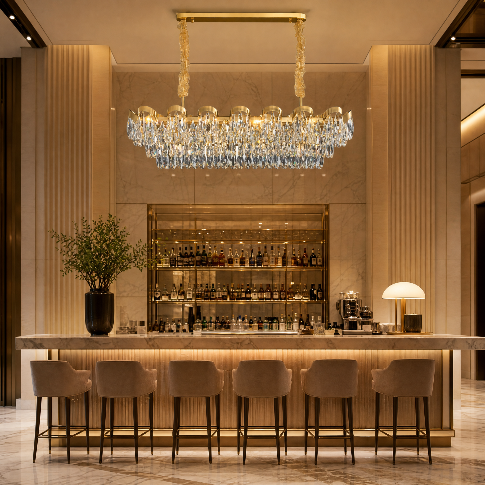 Upscale hotel lobby or restaurant interior beautifully lit by the artistic VORELLI Isso Rectangular Chandelier.