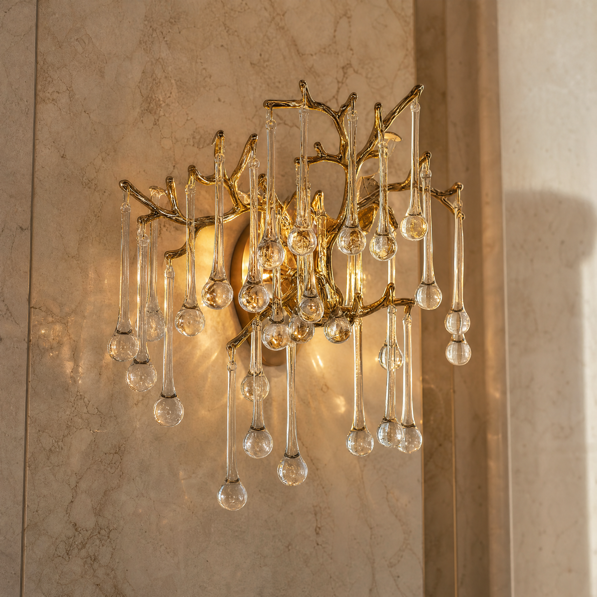 Macro shot of the L’Albero d’Oro wall light showcasing the fine craftsmanship of the organic metal branching and cascading glass drops.