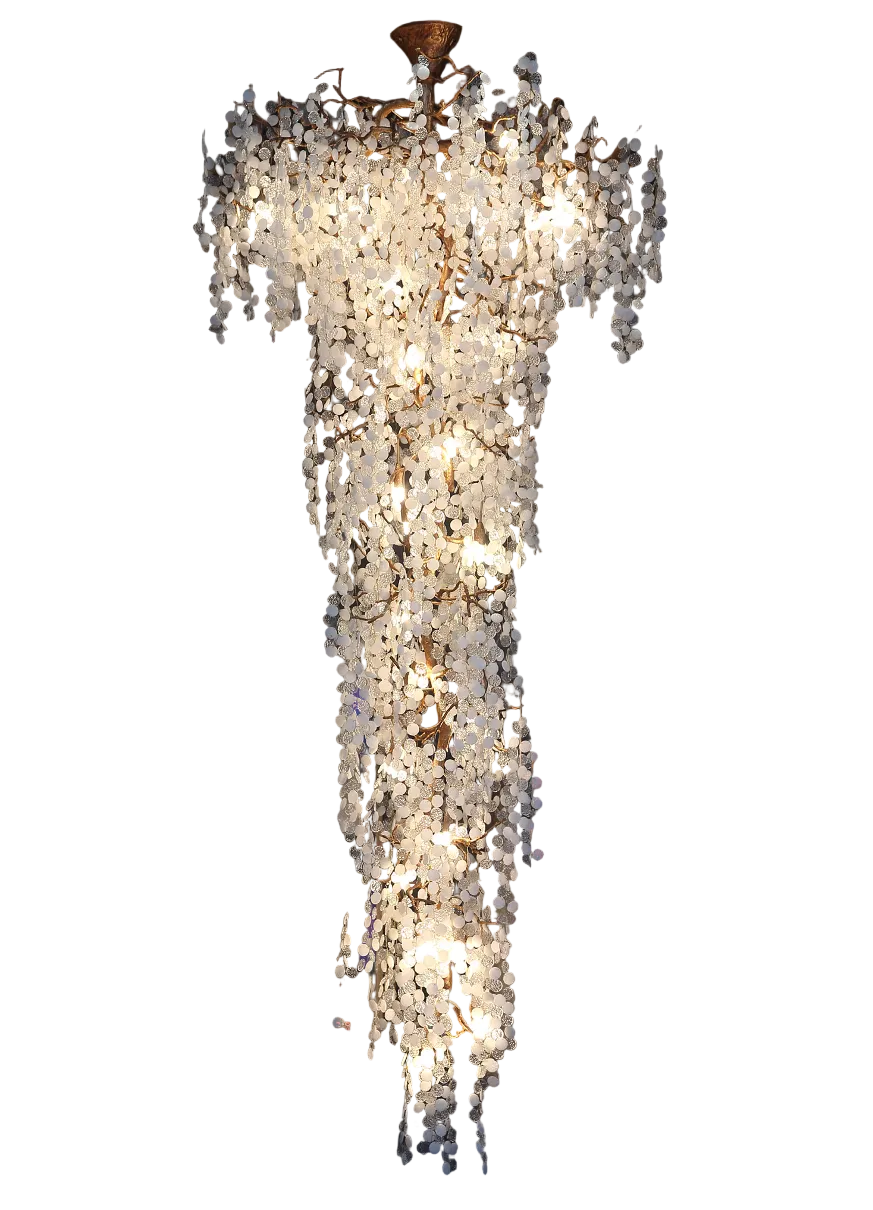 Luxury linear staircase chandelier with cascading textured glass discs and sculptural branches