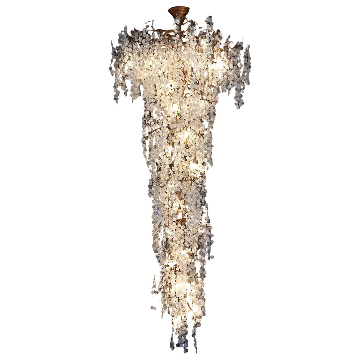 Luxury linear staircase chandelier with cascading textured glass discs and sculptural branches