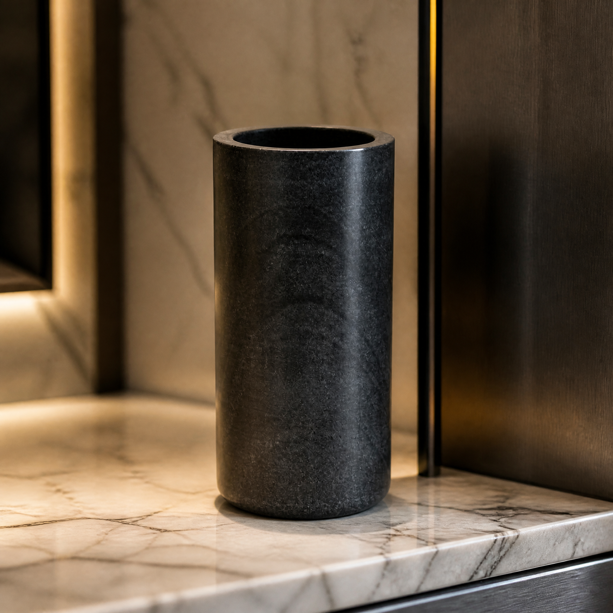 Detailed closeup of the VORELLI Lunetta H25CM vase, highlighting the clean lines and unique natural veining of the polished black marble.