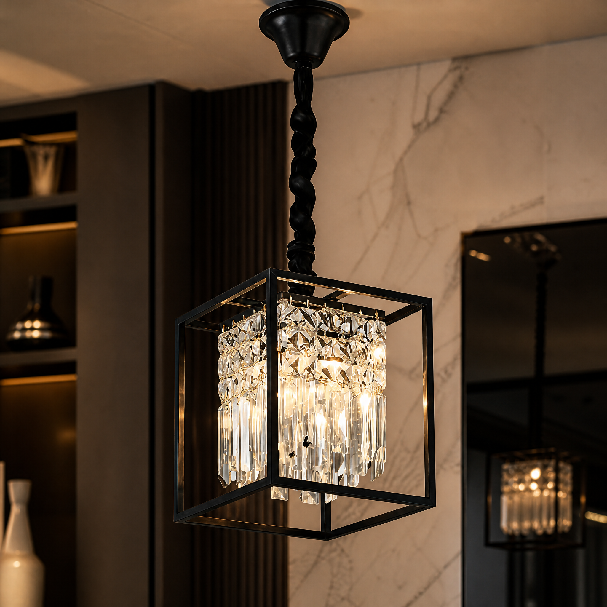 Macro closeup shot of the Maddison Pendant Light highlighting the diamond cut square crystals and polished metal cube frame.