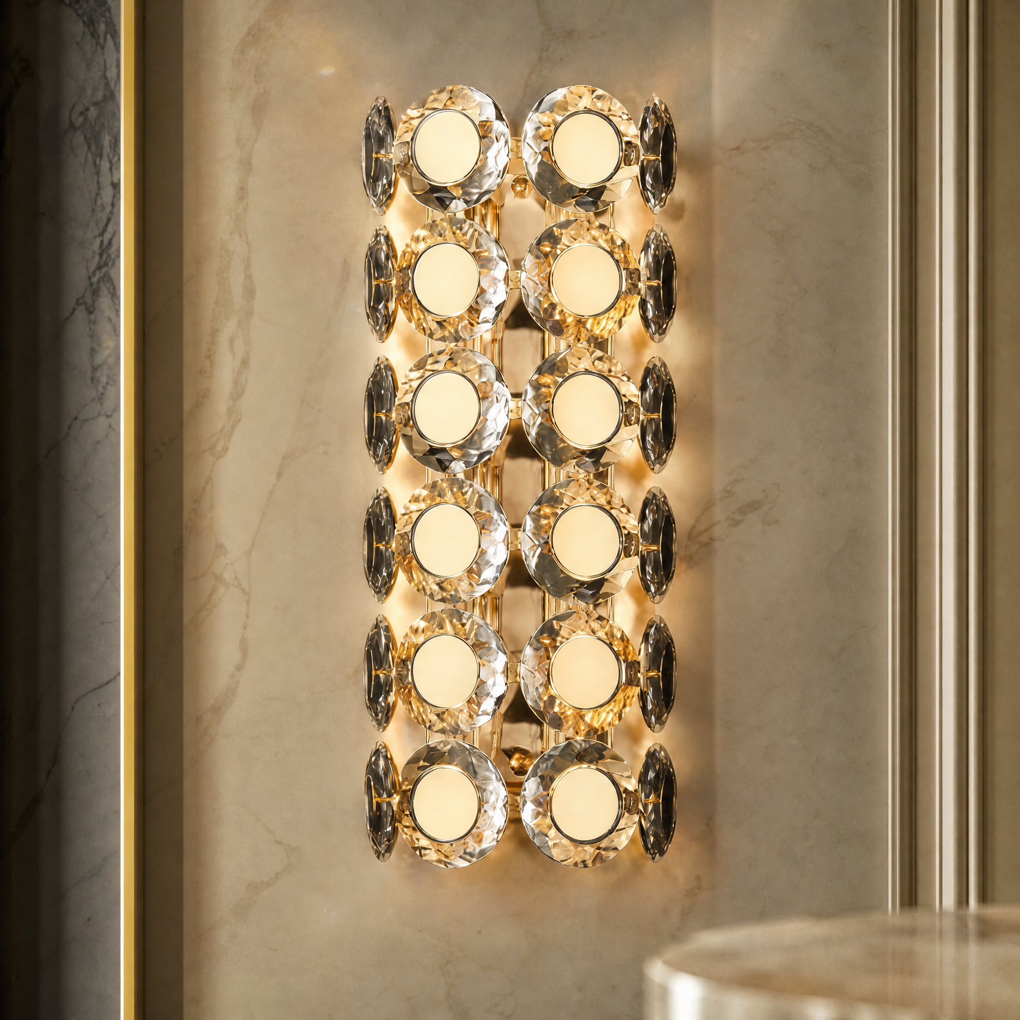 Macro view of the diamond-cut crystal discs and premium #4 Titanium Gold stainless steel circle on the Manzoni wall light.