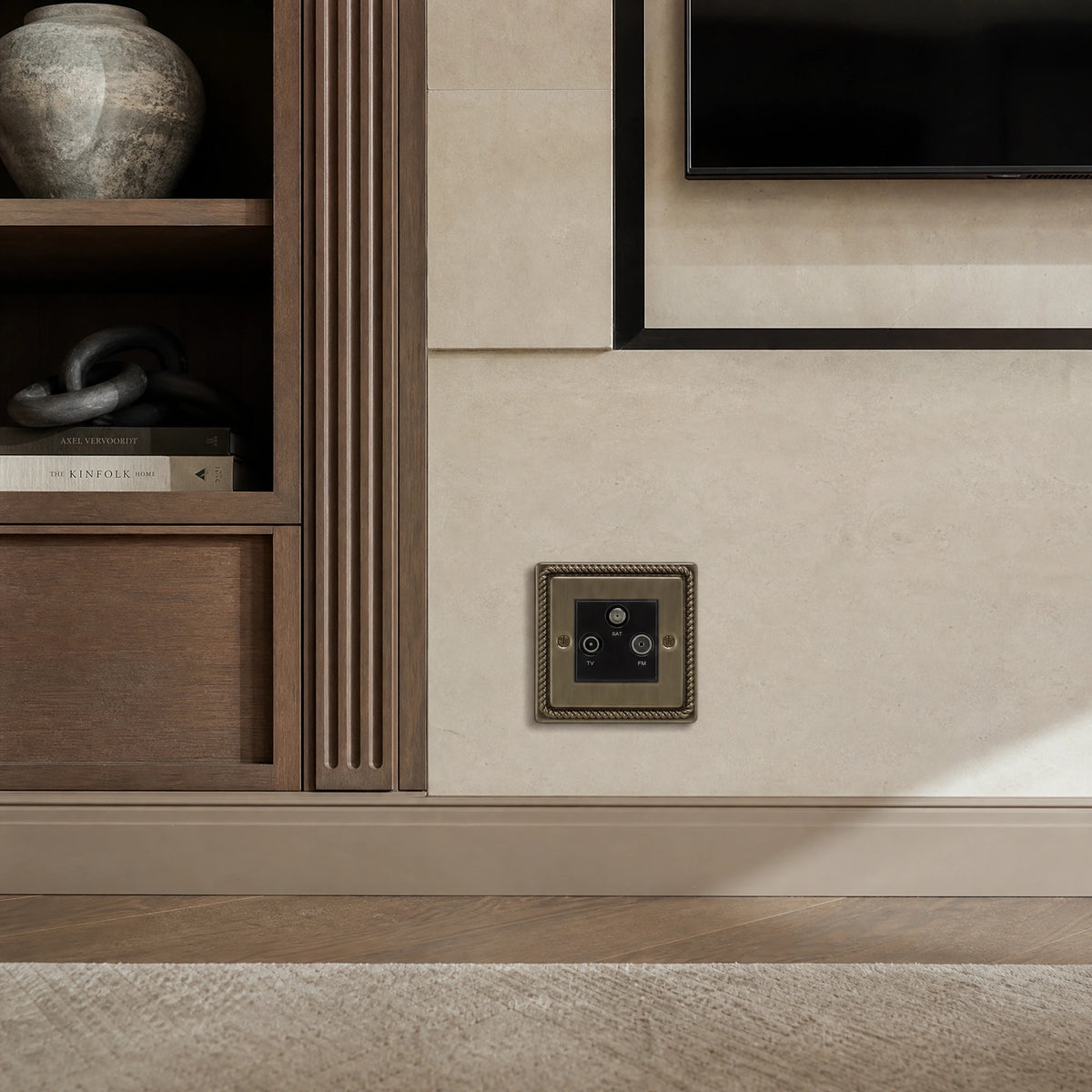 Luxury antique brass media outlet installed within bespoke media wall or integrated TV joinery in a private residence in a UHNW interior by VORELLI®.