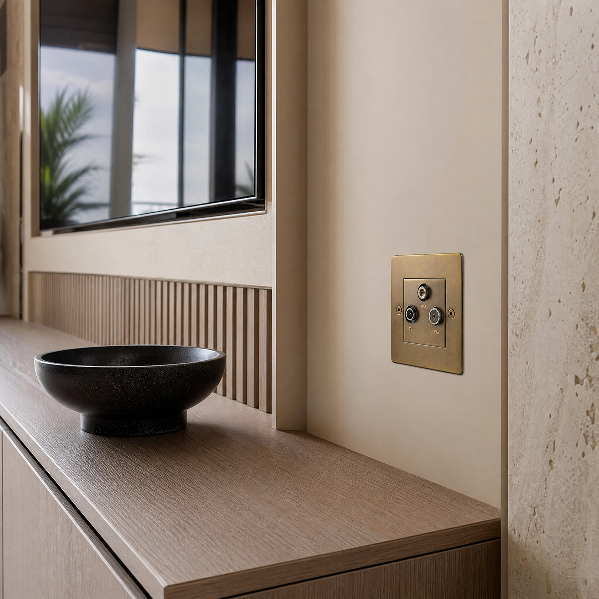 Luxury antique brass media outlet installed within bespoke media wall or integrated TV joinery in a private residence in a UHNW interior by VORELLI®.