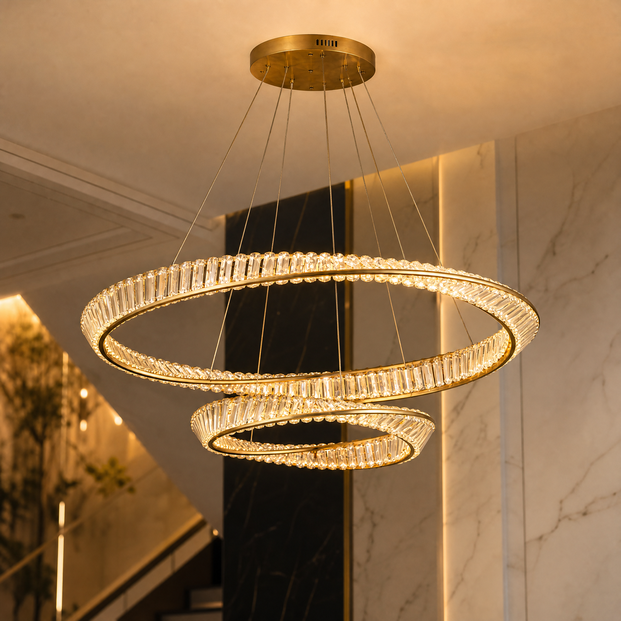 Macro closeup of the shimmering crystal bars and premium textured metal finish on the VORELLI Melia circular chandelier frame.
