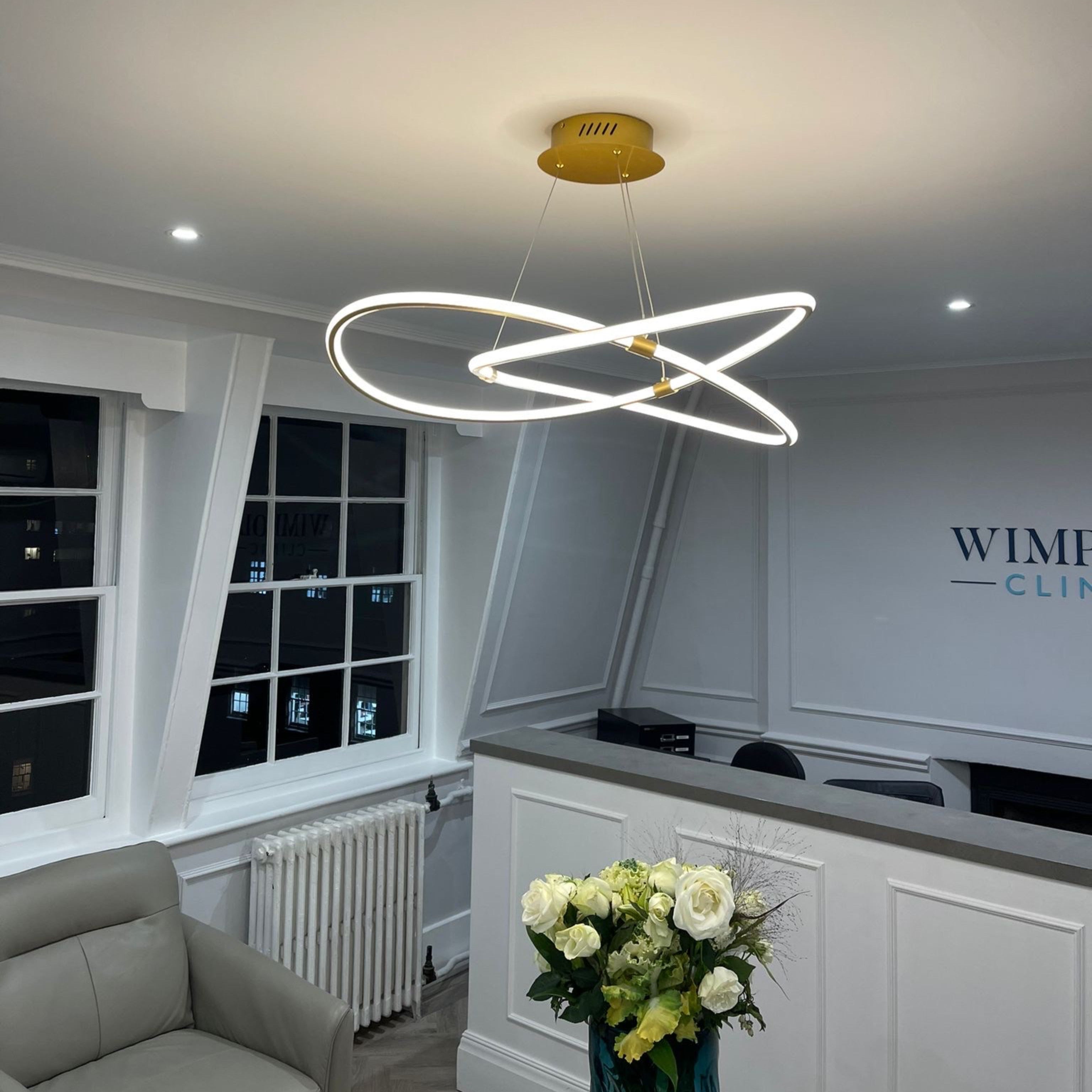 VORELLI Milano sculptural circular LED chandelier displayed in a refined modern interior