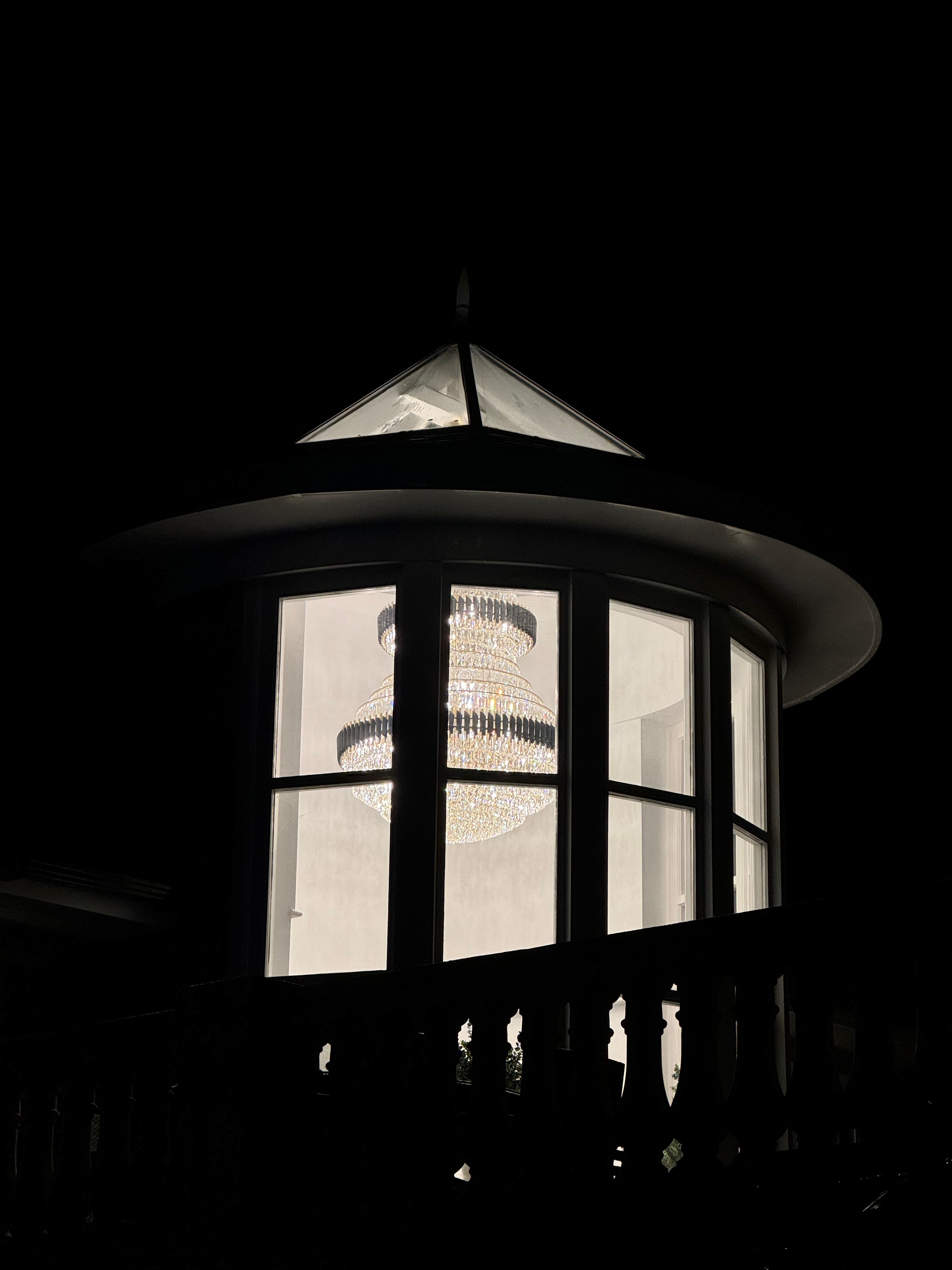 Close-up of black architectural fins and crystal drops on the VORELLI Milltimber Grandeur Staircase Chandelier II