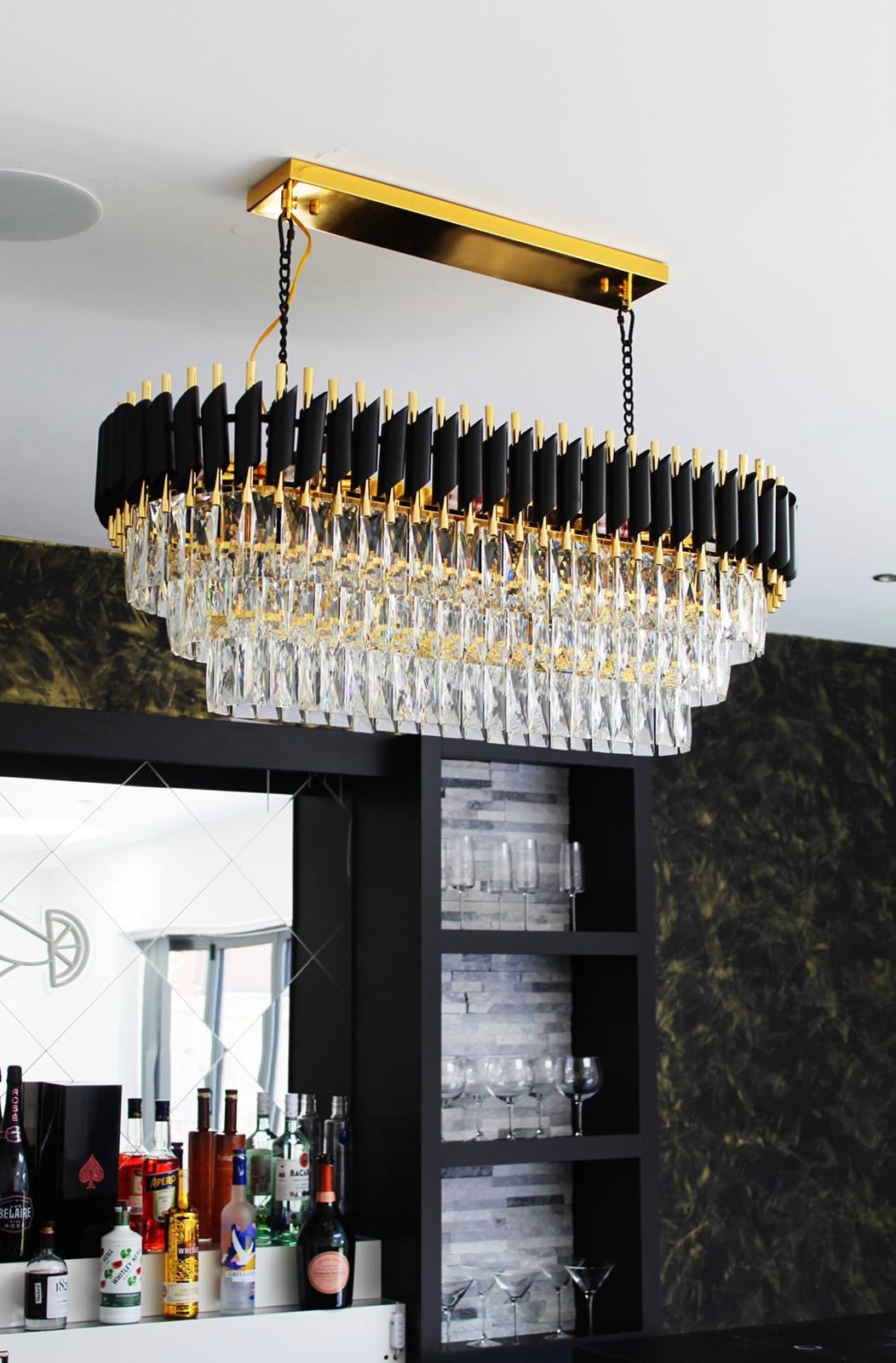 VORELLI® Milltimber luxury rectangular chandelier with diamond cut crystals suspended in refined interior space