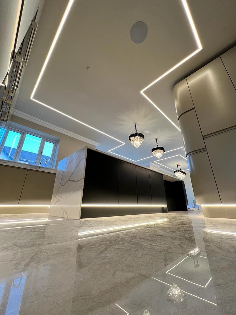 VORELLI Milltimber Pendant Light installed in a contemporary ceiling setting with layered crystal drops and cylinder tubing