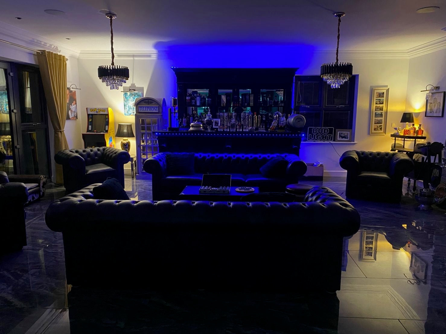 Warm ambient glow of the VORELLI Milltimber Pendant Light illuminating a luxury interior at night