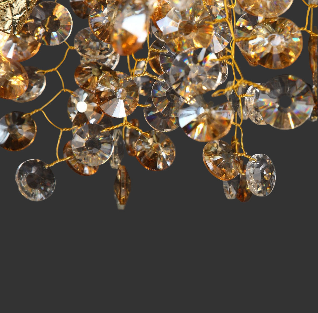 Close-up of the VORELLI® Mimosa Wall Light showcasing cascading crystal disc detailing
