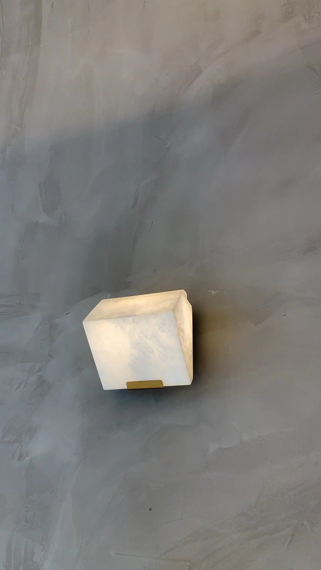 VORELLI® Novara marble wall sconce installed in refined interior creating soft ambient glow