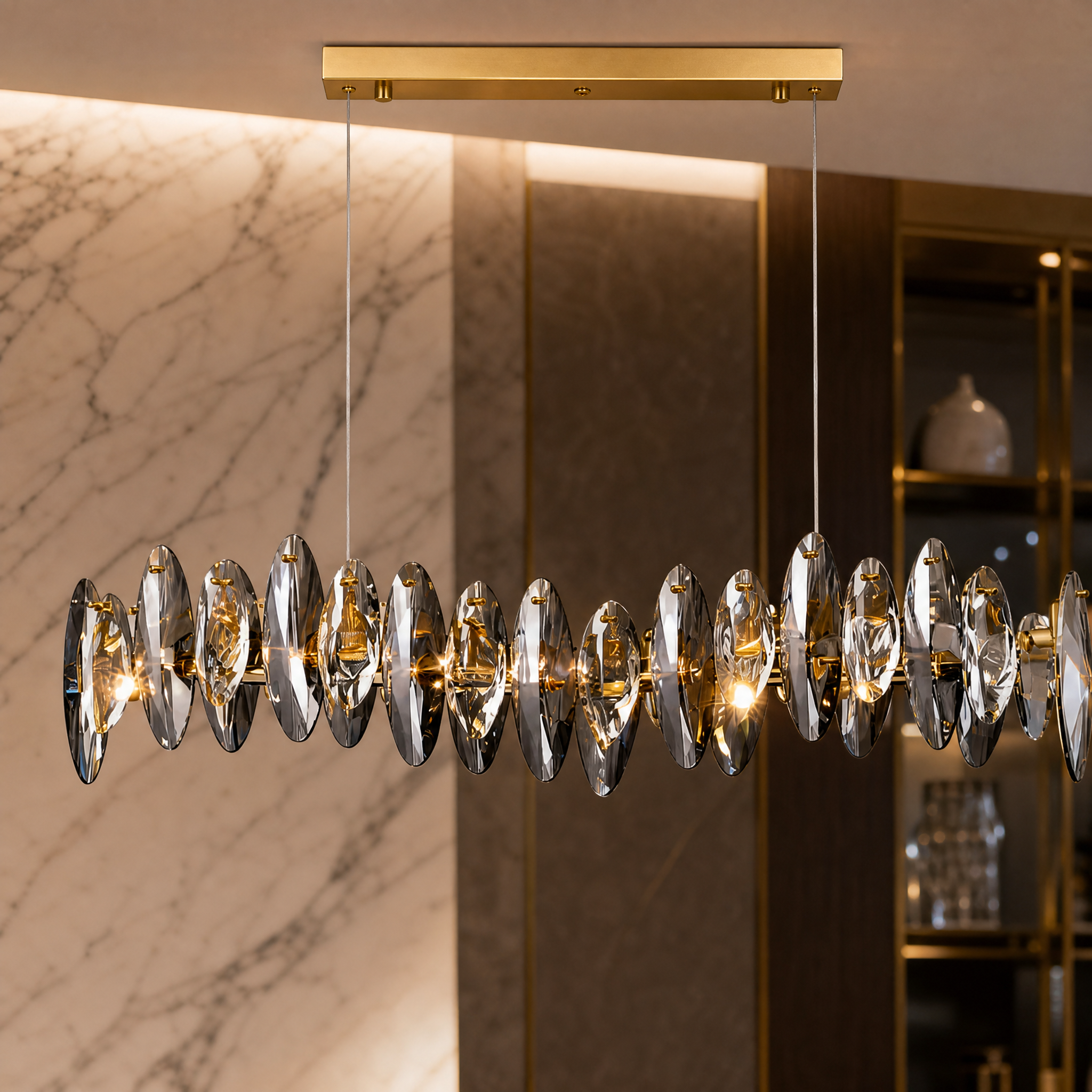 Close-up detail of the interlocking clear and smoky crystal ovals on the VORELLI Oakhill rectangular chandelier.