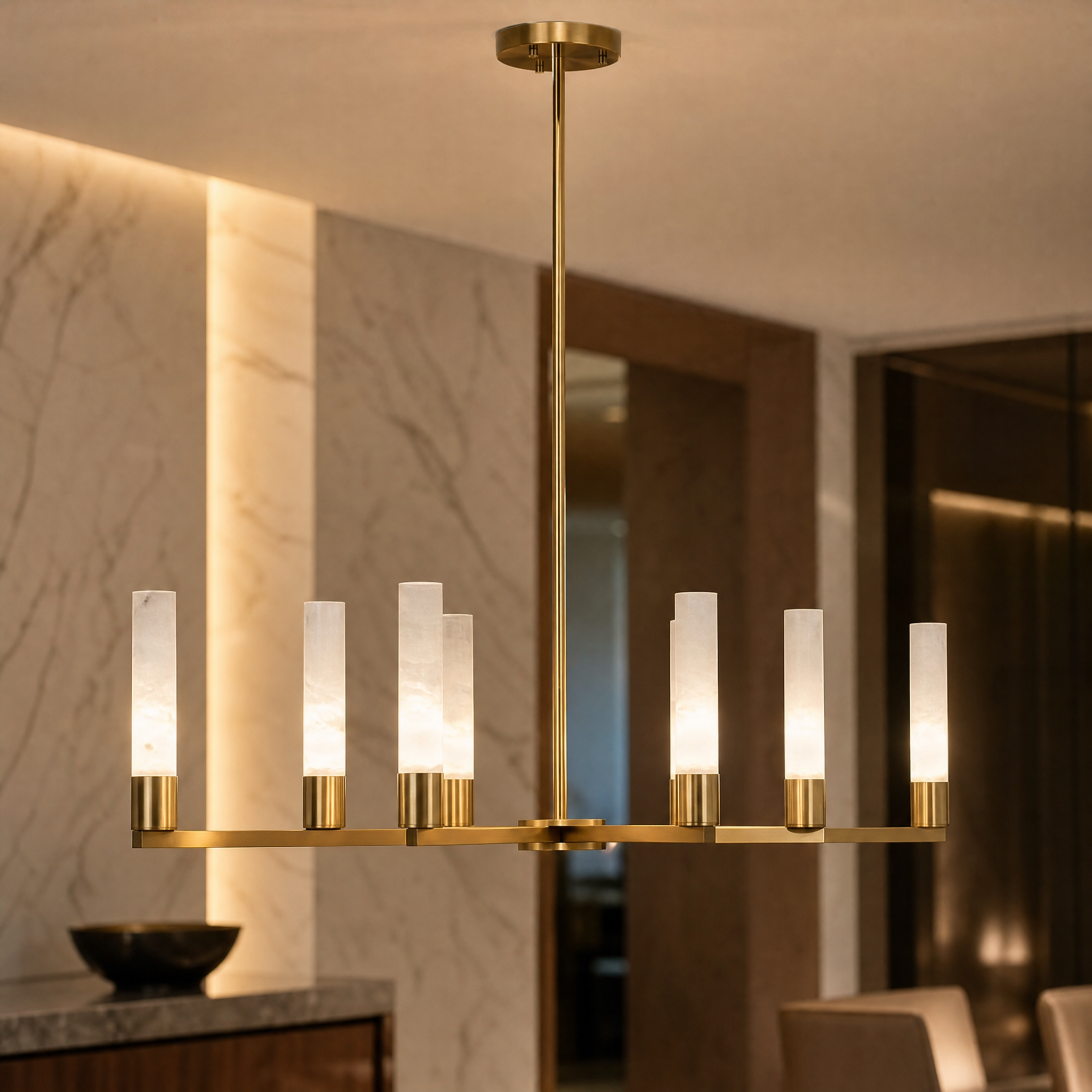 Macro closeup of the VORELLI Oritano chandelier showcasing the exquisite Spanish alabaster tubes mounted on premium brass arms.